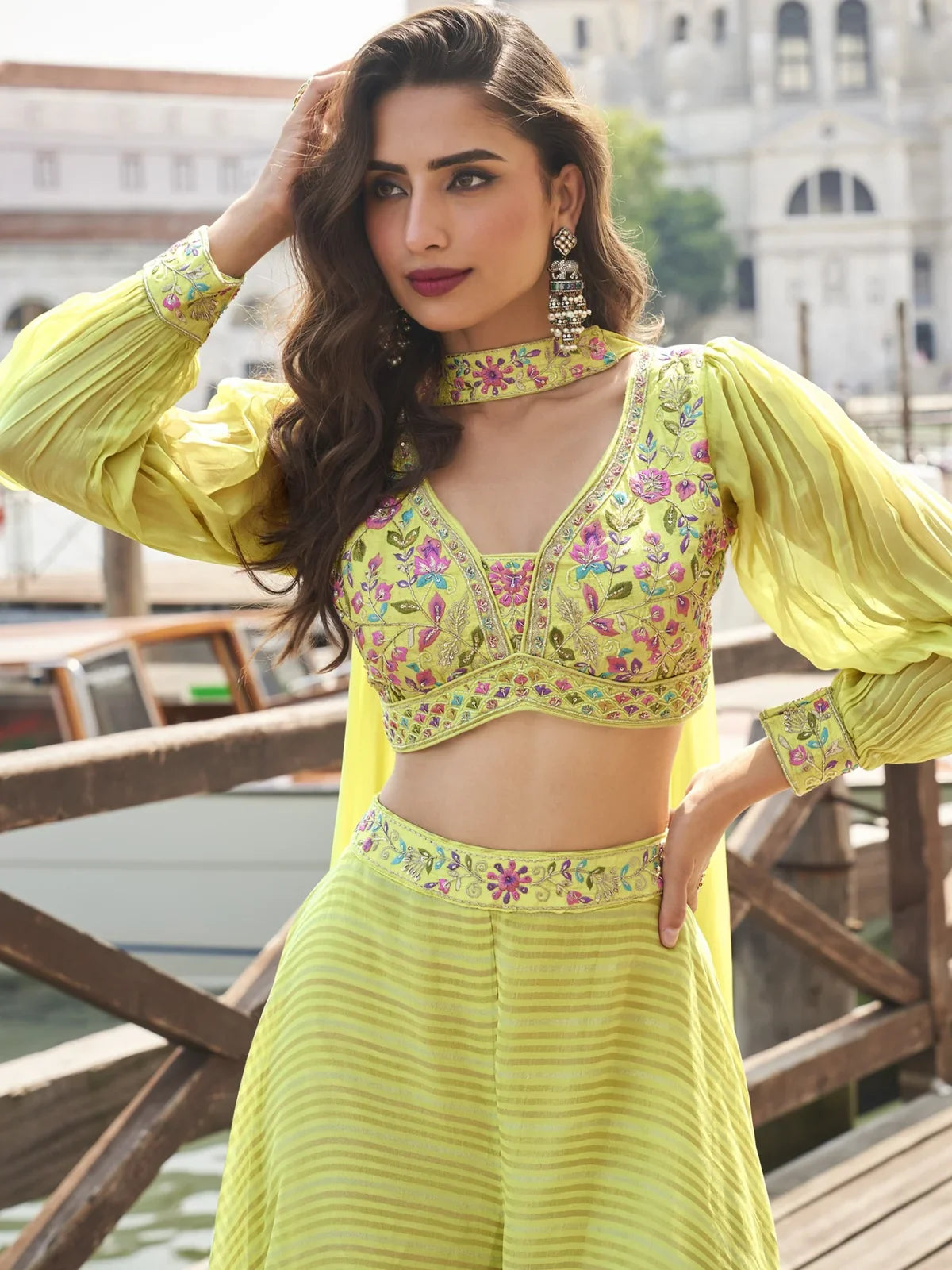 Tarani yellow silk sharara suit upper body view with floral embroidery blouse