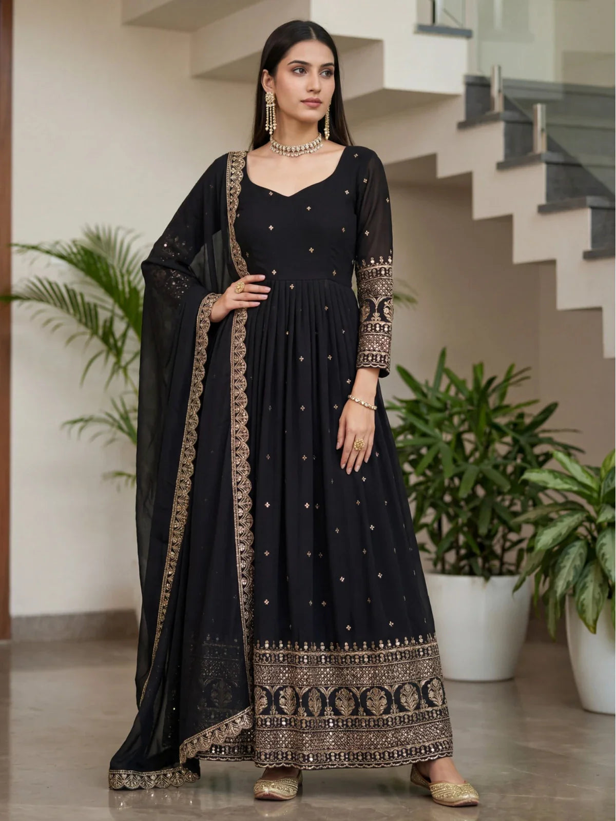 Tarani black silk gown full front view with golden embroidery for weddings