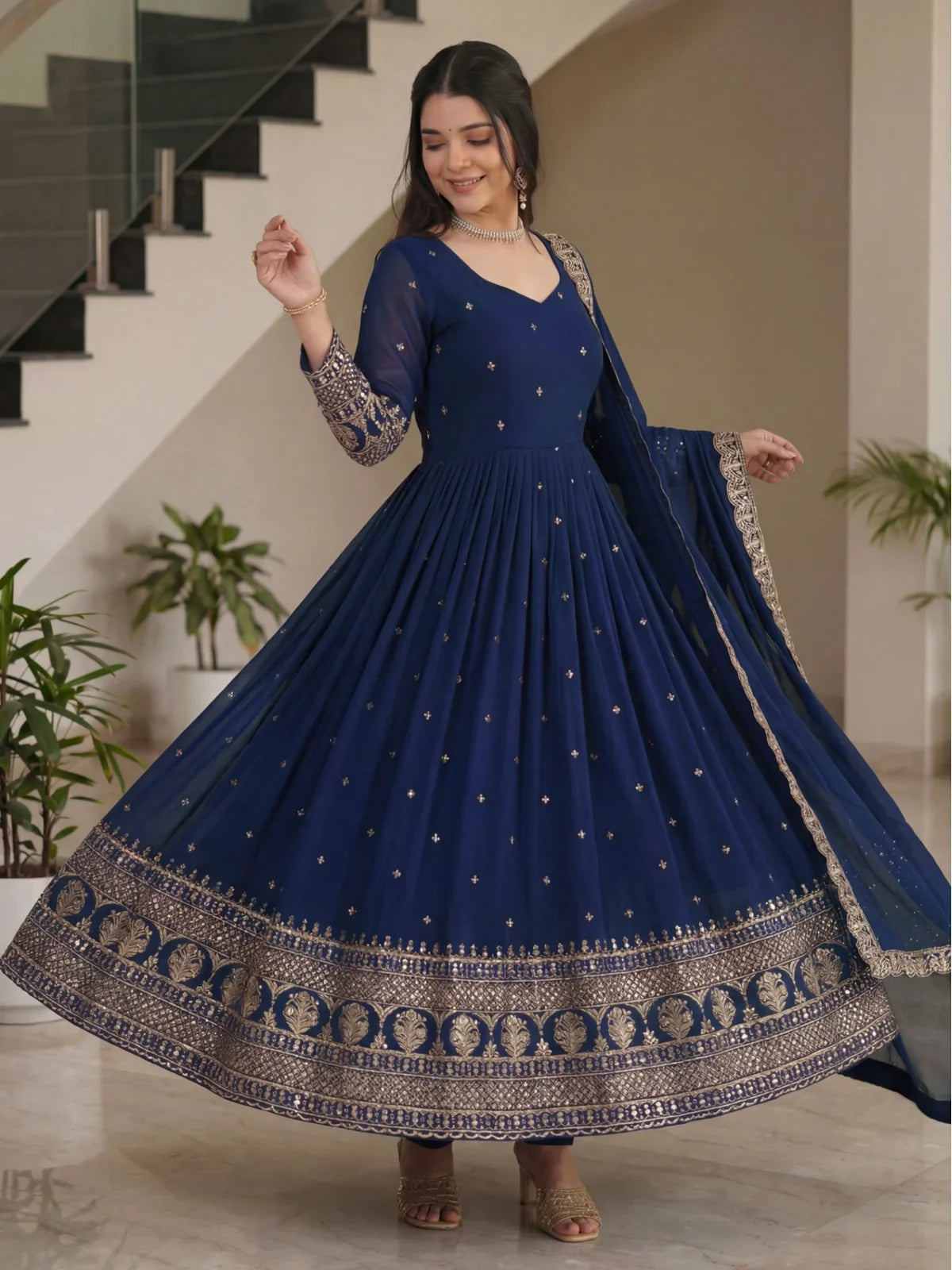 Tarani navy blue silk gown front twirl view showing detailed hemline work