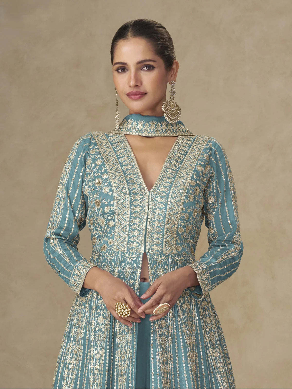 Tarani teal silk gown front upper body close-up view with embroidery details