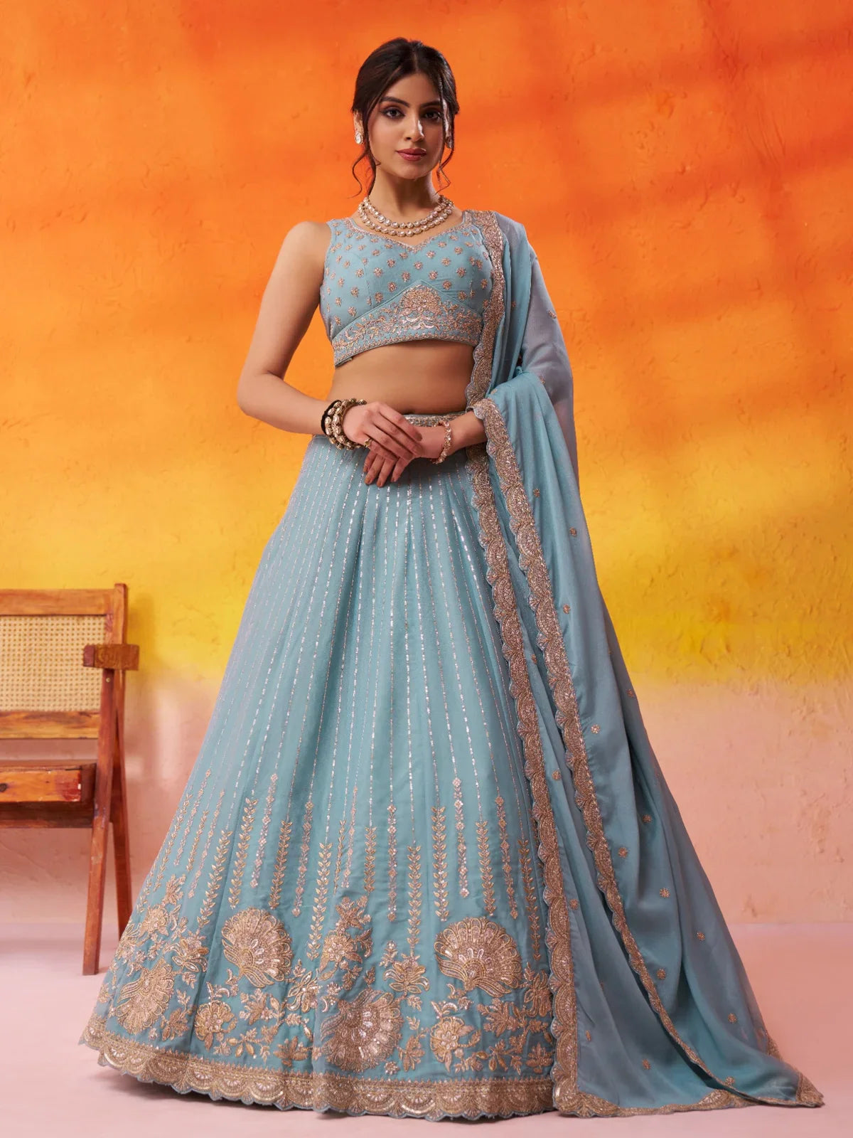 Tarani premium blue tissue silk lehenga with gold embroidery and full flair for wedding functions