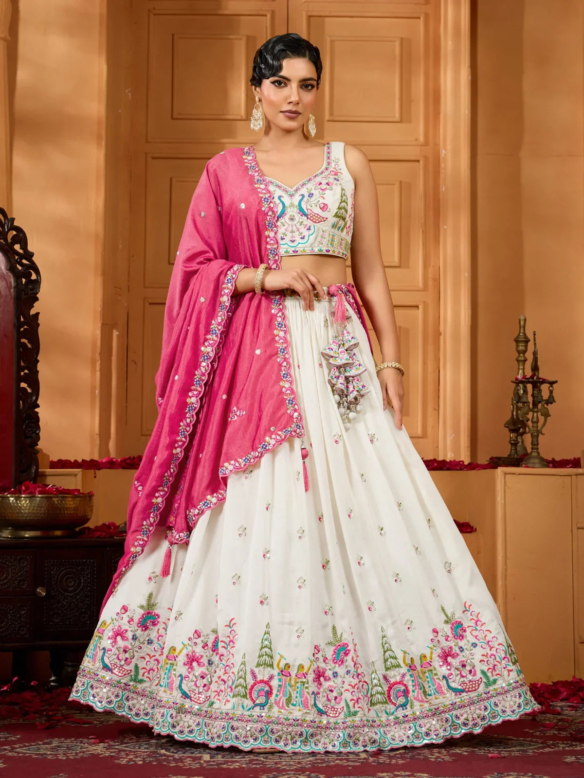 Tarani premium blue silk lehenga with pink dupatta and embroidered blouse for weddings