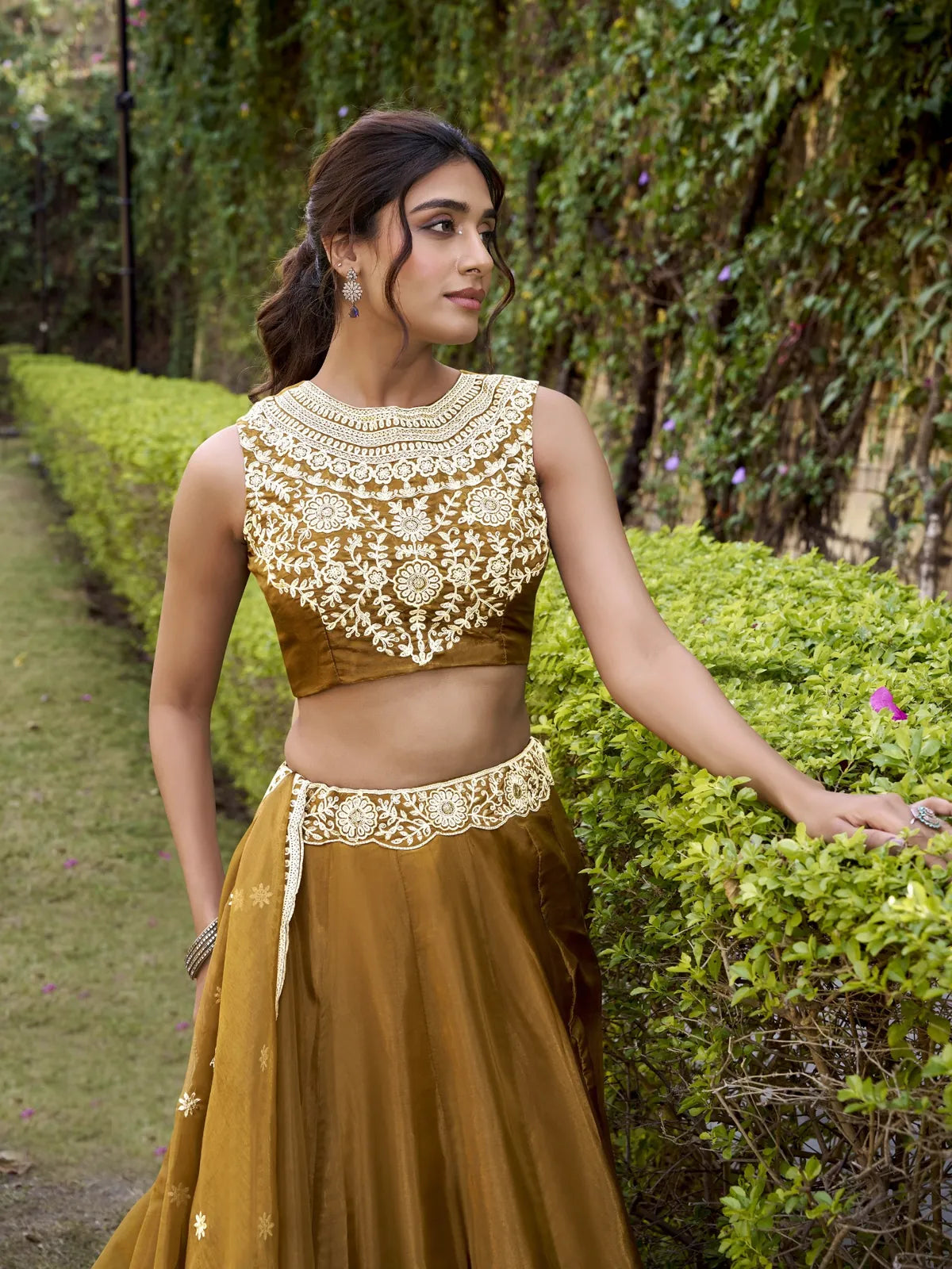 Tarani embroidered chanda silk lehenga blouse in brown with neckline closeup view