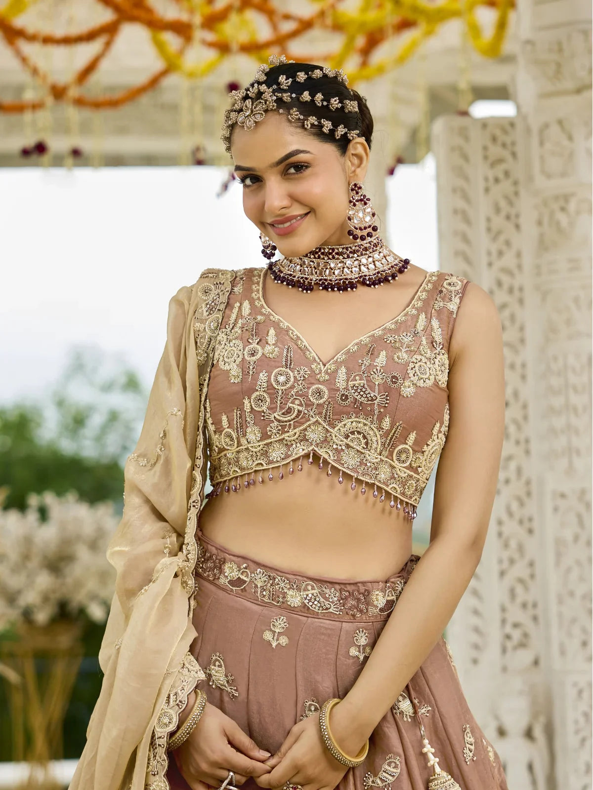 Tarani brown silk lehenga upper body view showing embroidered blouse