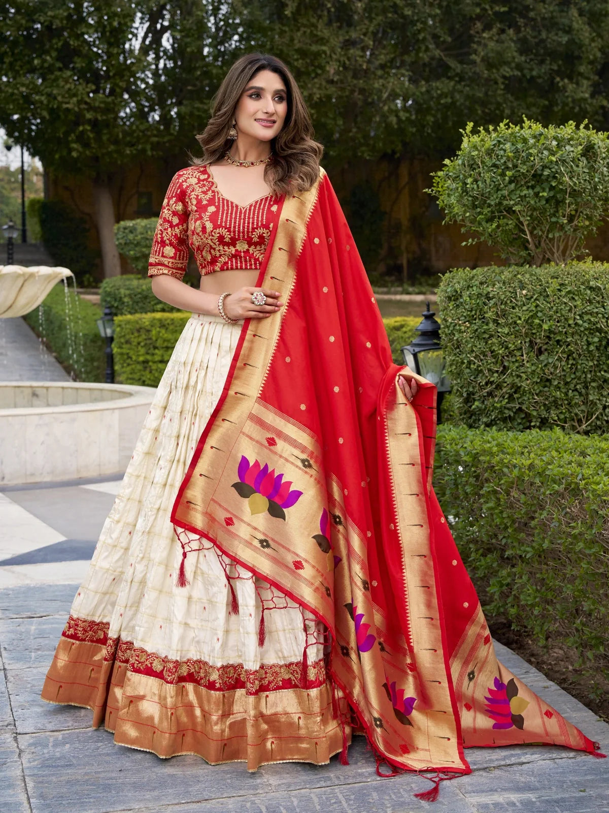 Tarani cream silk lehenga with red embroidered blouse and paithani dupatta full view