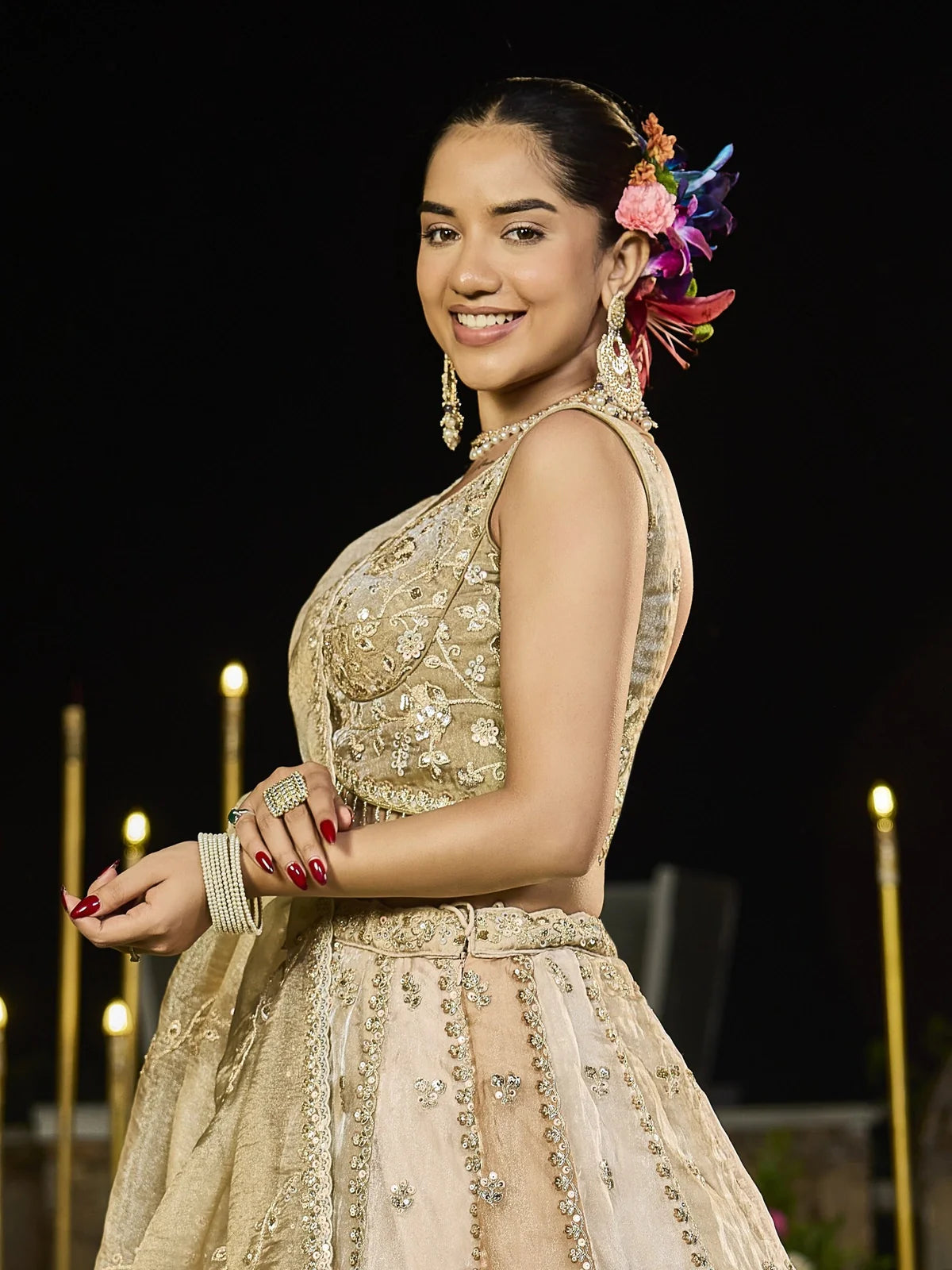 Tarani golden silk lehenga elegant side pose view