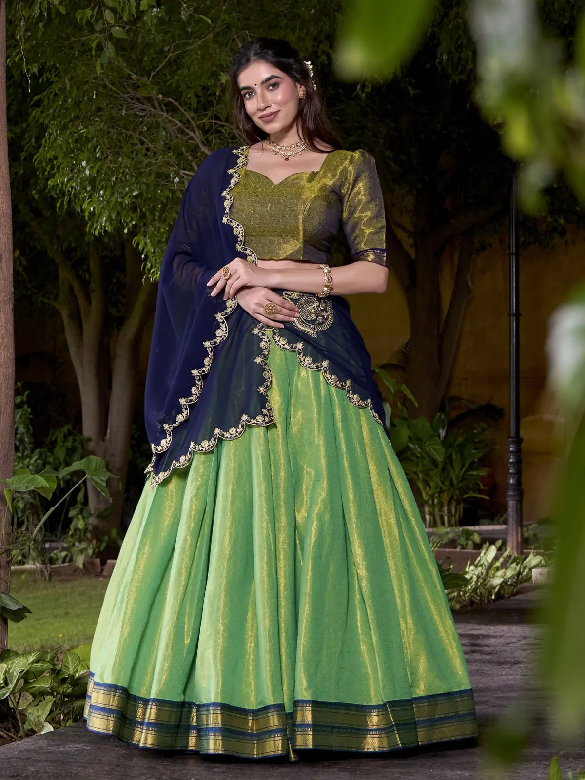 Tarani green Kanchipuram silk lehenga with zari work and embroidered dupatta full front view