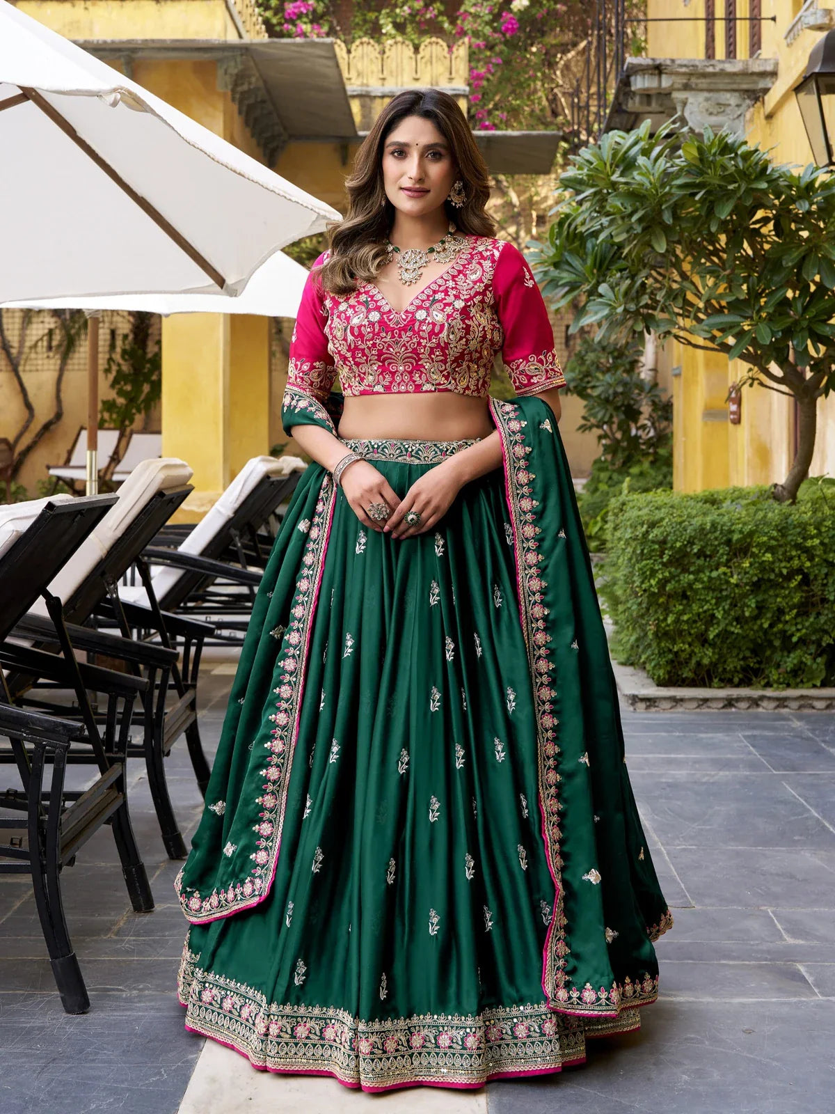 Tarani green silk lehenga full front view with embroidered pink blouse for festive and wedding