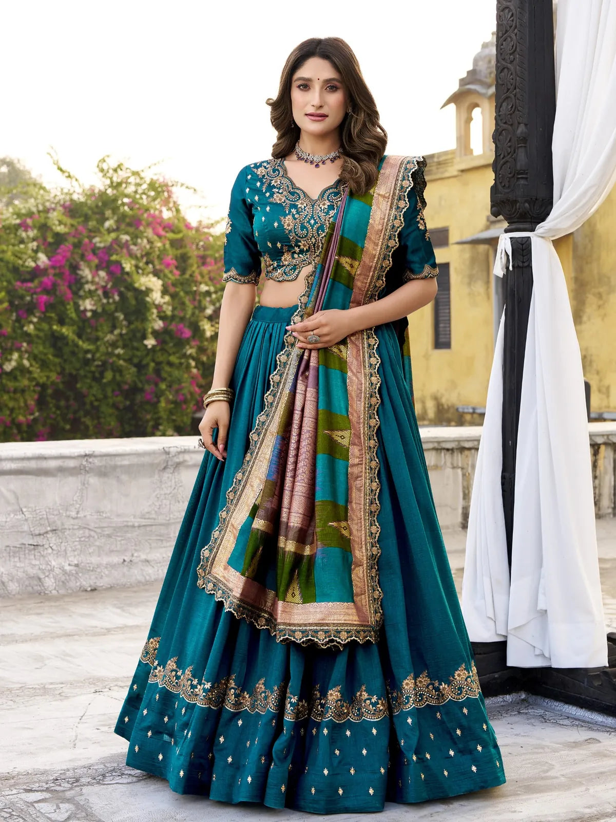 Tarani premium green silk lehenga with zari embroidery, full front view showing blouse and dupatta