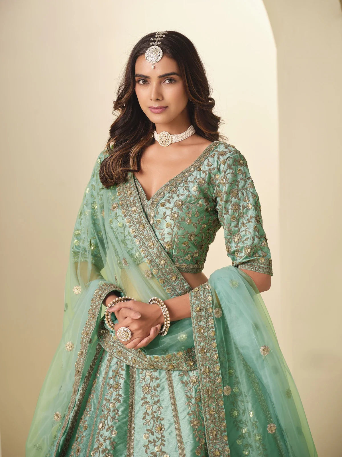 Tarani elegant green silk lehenga showing close-up of blouse and dupatta