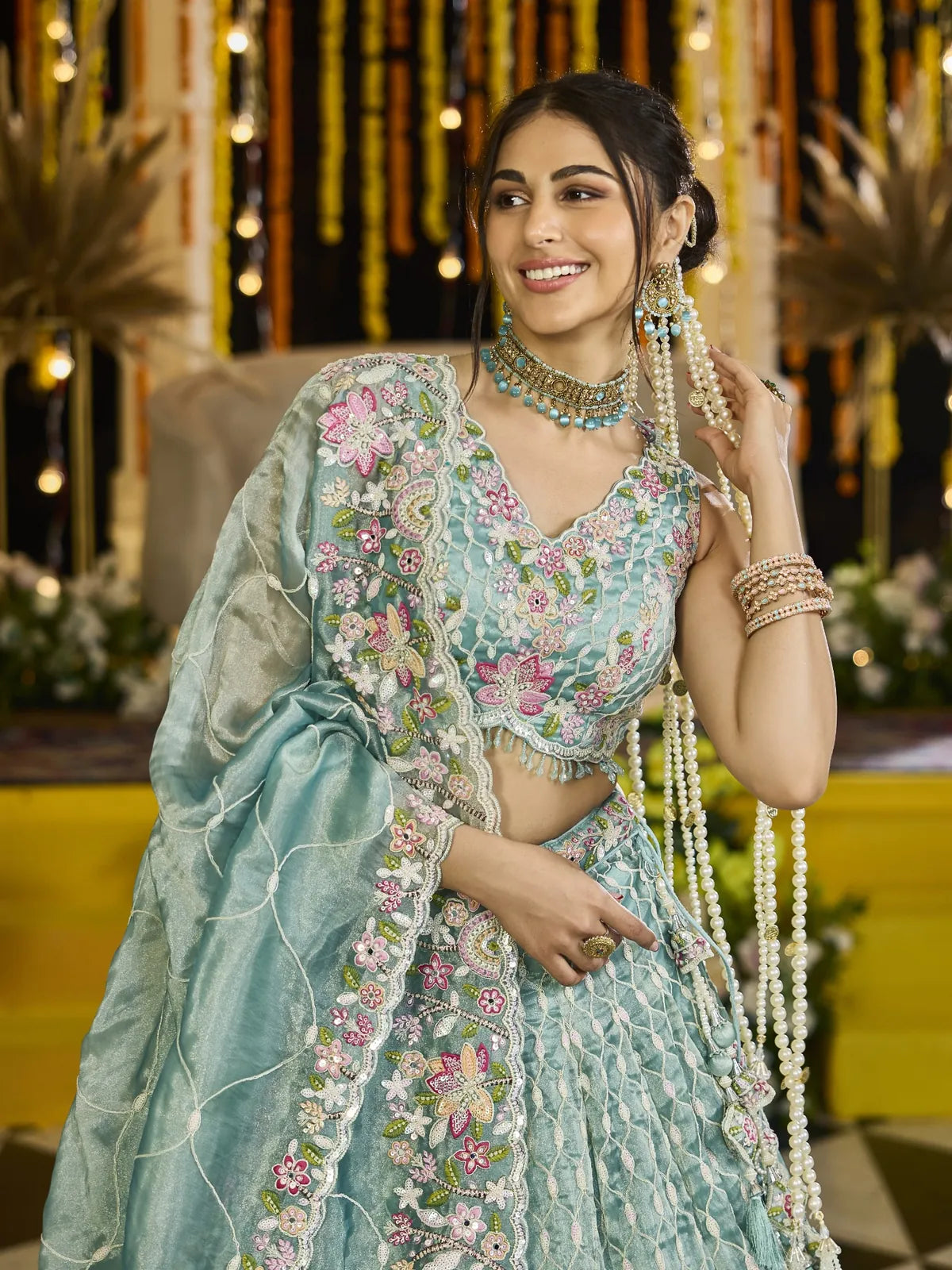 Tarani green silk lehenga close view with embroidered blouse and dupatta