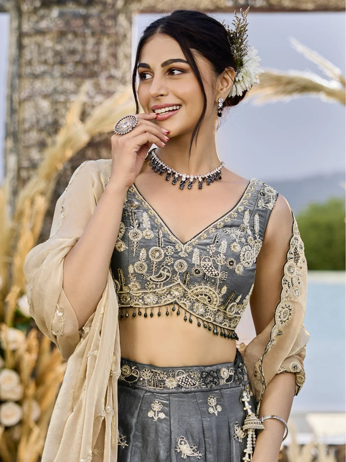 Tarani grey silk lehenga with sweetheart blouse embroidery upper body view