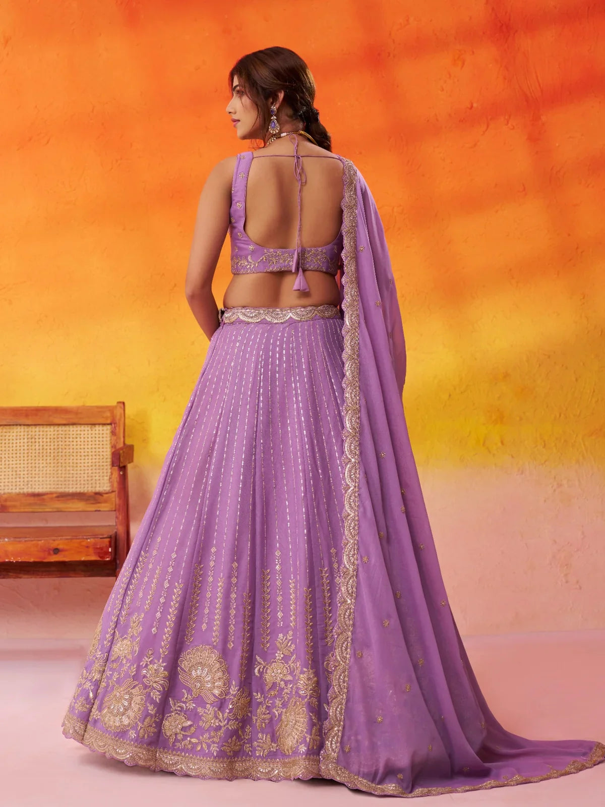 Back view of Tarani mauve lehenga blouse with dori tie-up and sequin embroidery