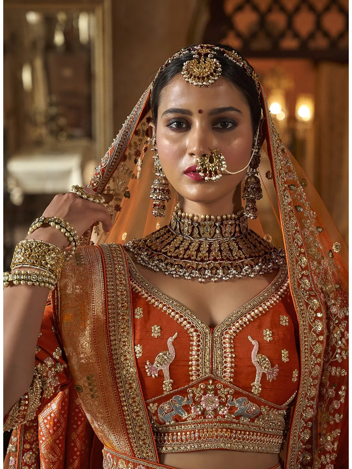 Tarani bridal orange silk lehenga upper body view with blouse embroidery