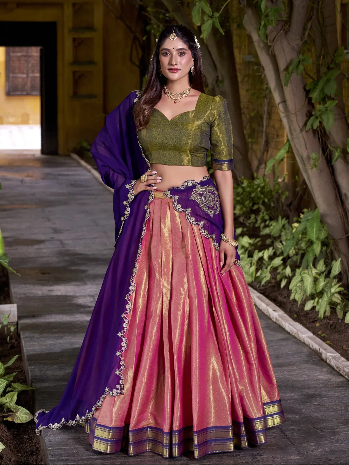 Tarani pink kanchipuram silk lehenga with zari weaving and embroidered purple dupatta full view