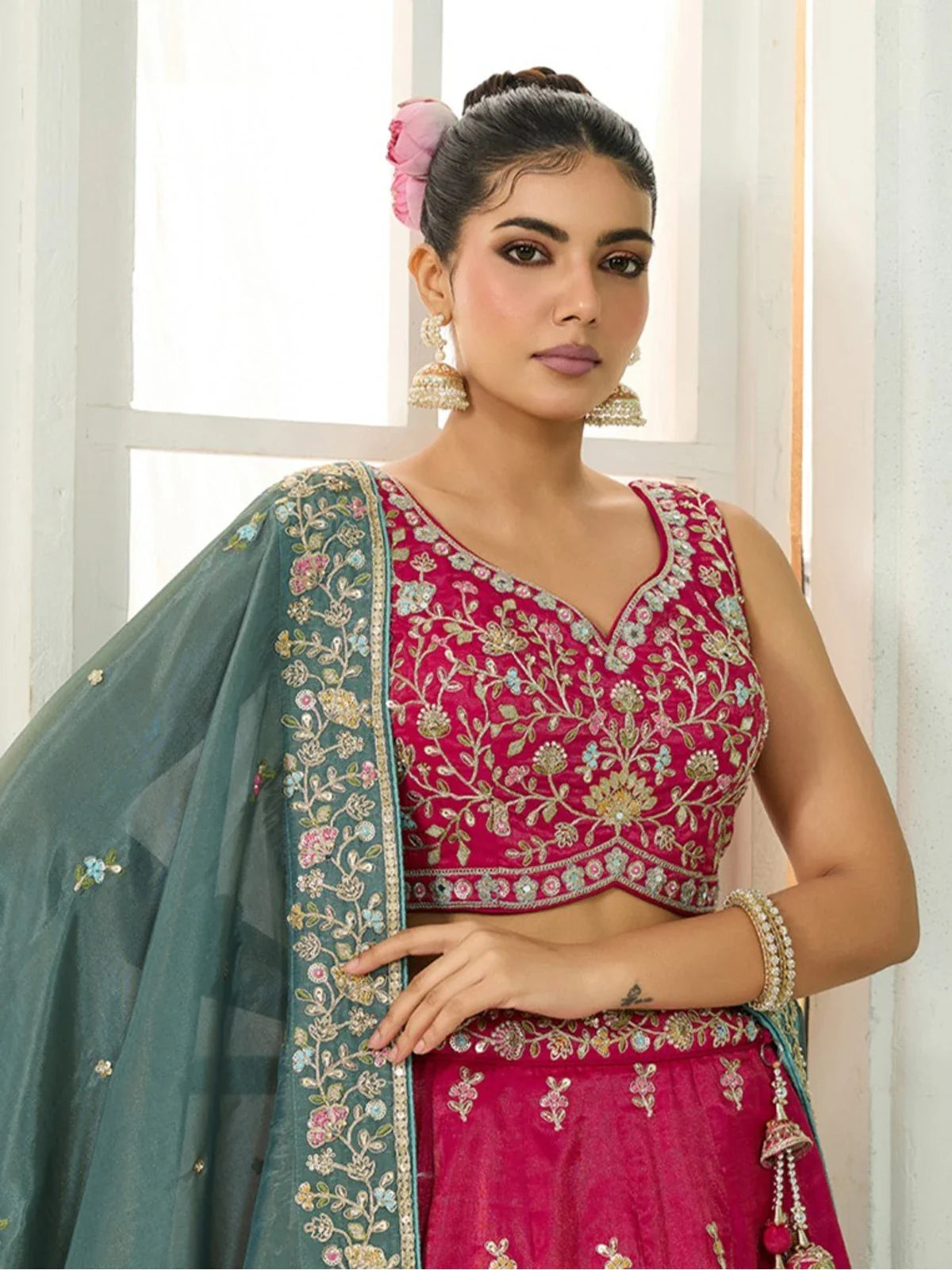 Tarani upper body view of pink silk lehenga blouse and dupatta with embroidery