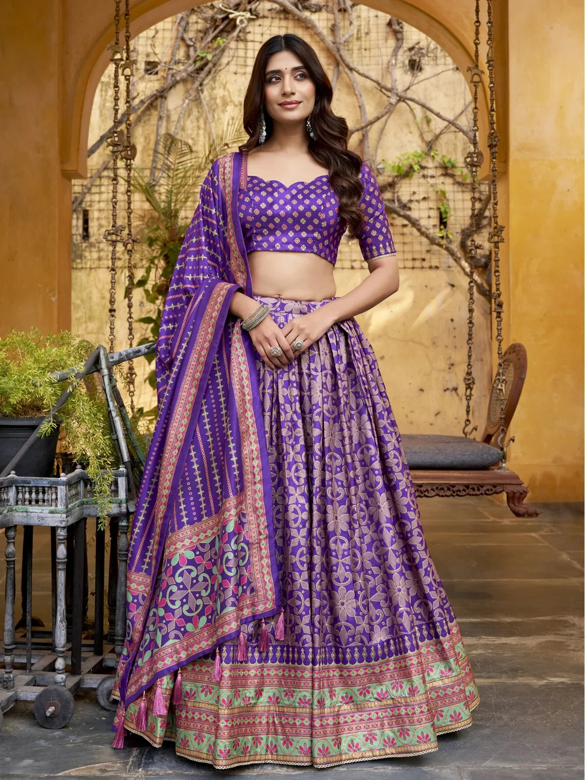 Tarani festive purple silk lehenga with iconic sparkle work and full flare front view