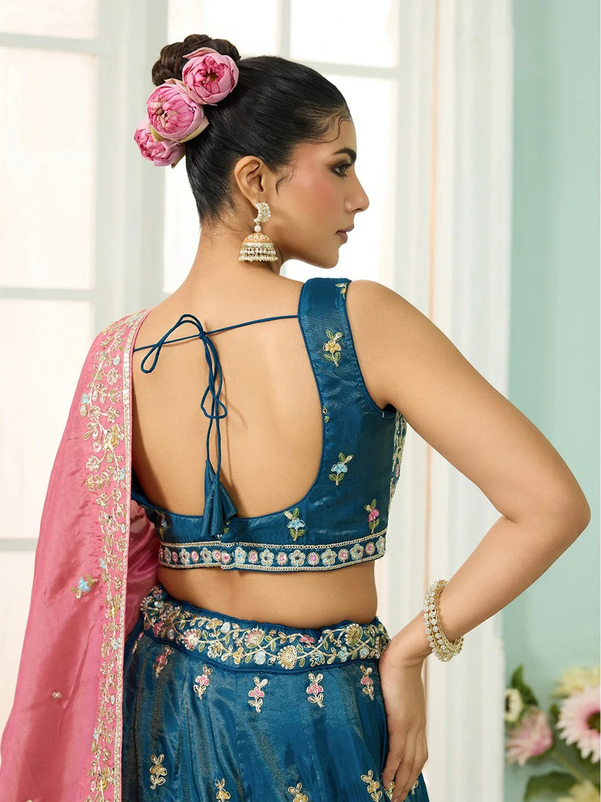 Tarani teal silk lehenga back blouse view with embroidery