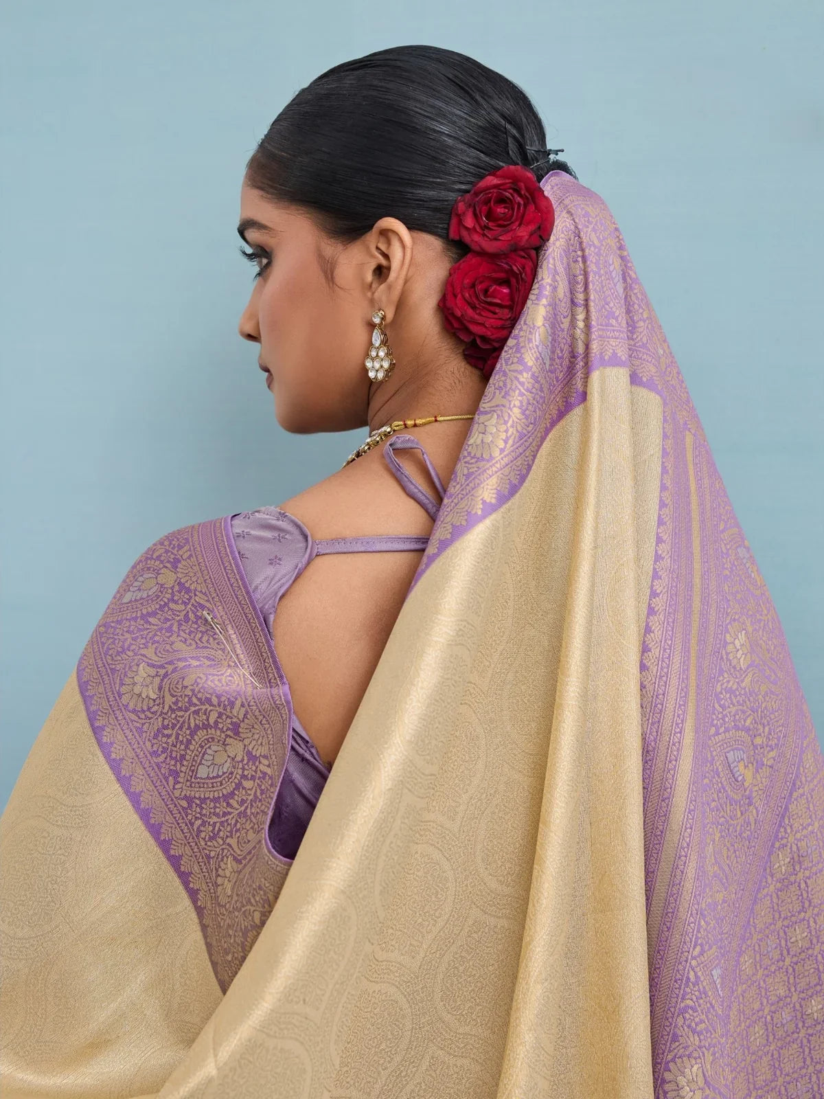 Tarani beige silk saree with lilac border back blouse style view
