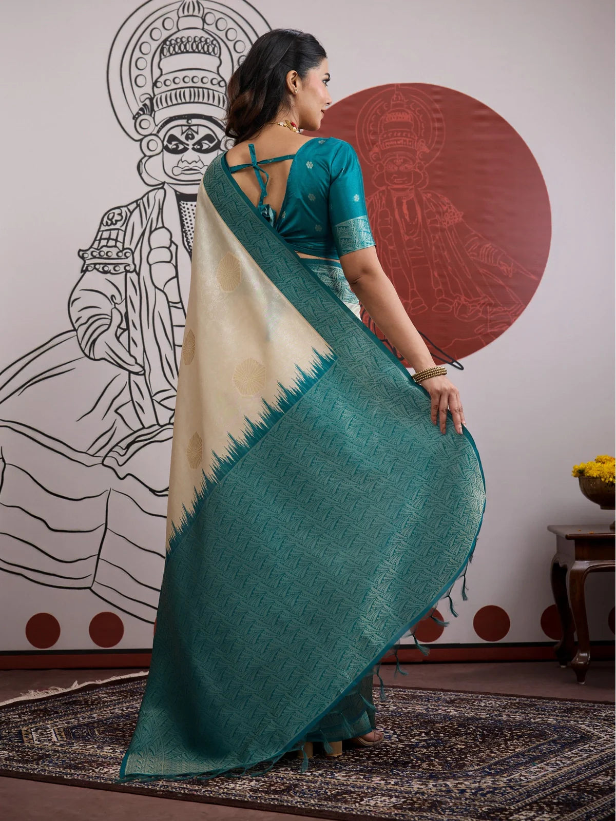Tarani teal blue stitched blouse back style with tie-up and woven sleeve detail for silk saree