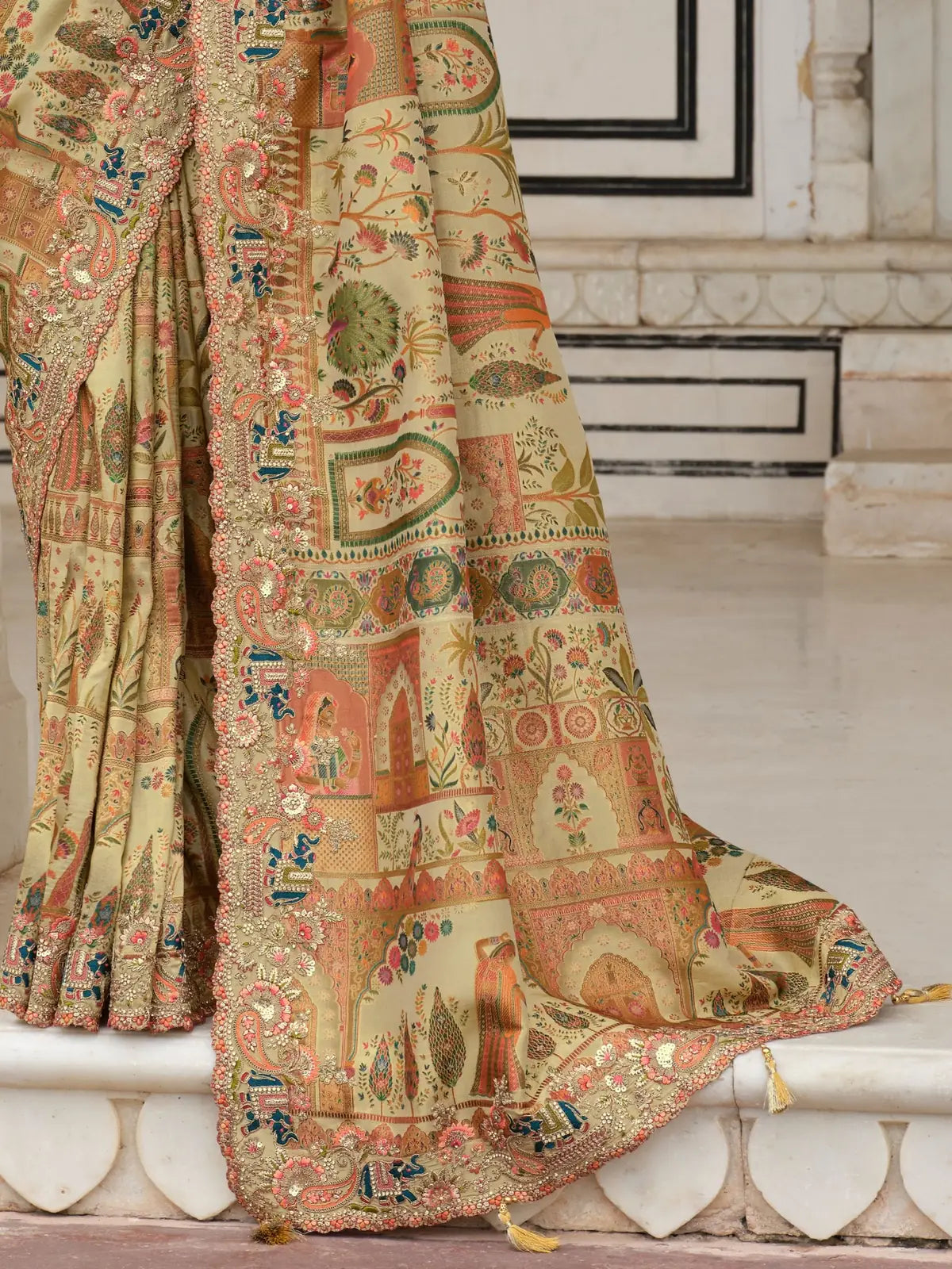 Tarani fabric detailing of beige silk saree with position print and sequin highlights for elegant occasions
