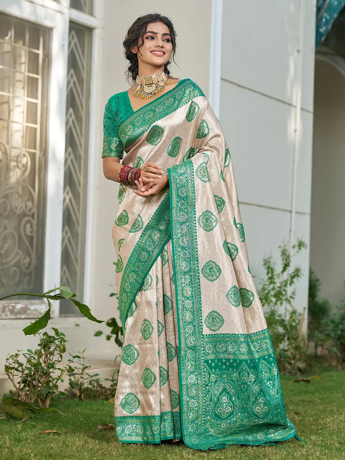 Tarani Pushpita Silk Blend Saree in beige with green woven border full view for wedding and festive wear