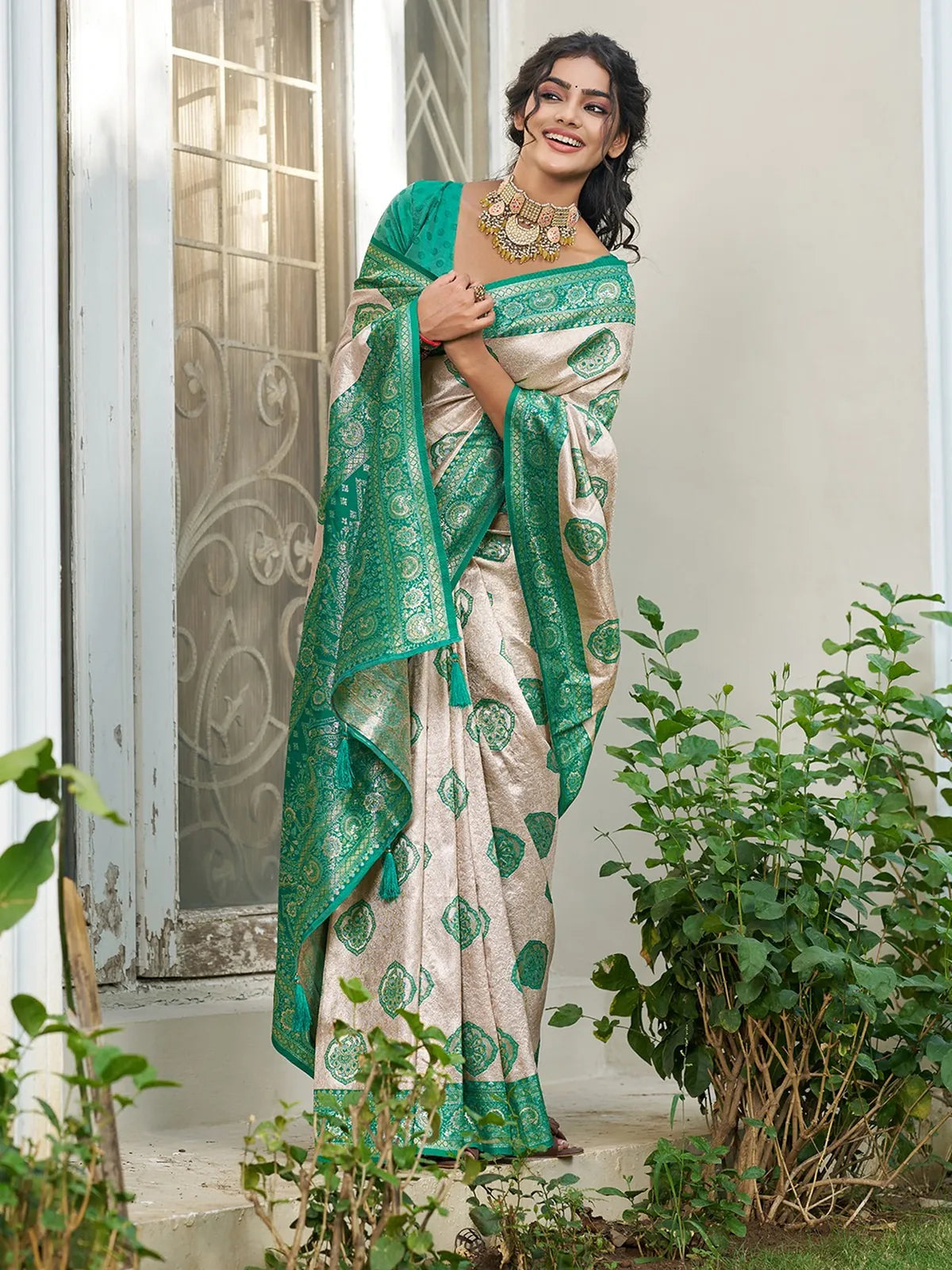 Tarani Pushpita Silk Blend Saree pallu view showcasing rich woven border and zari work