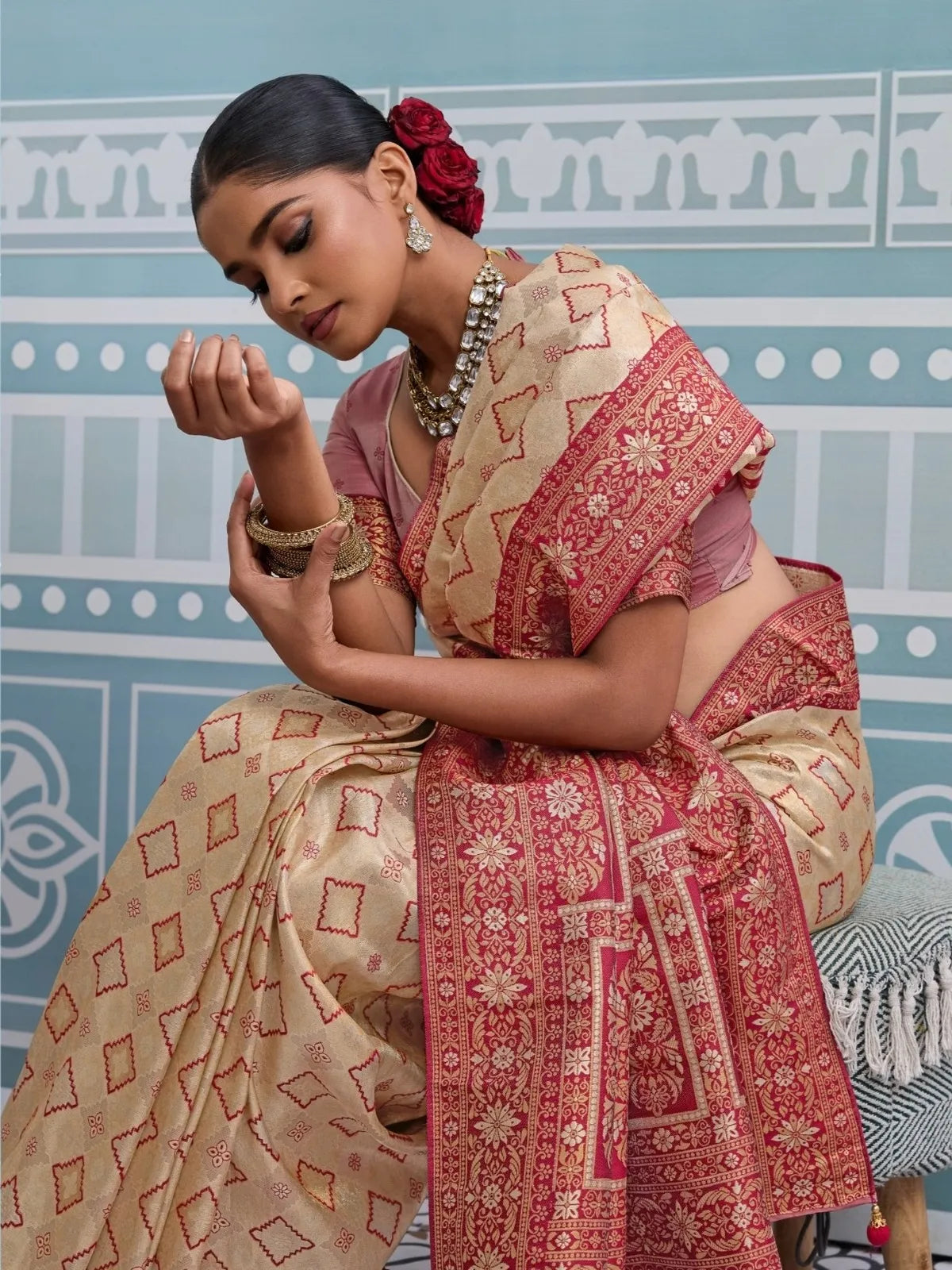 Tarani beige silk saree pallu view with broad zari border and meenakari weaving