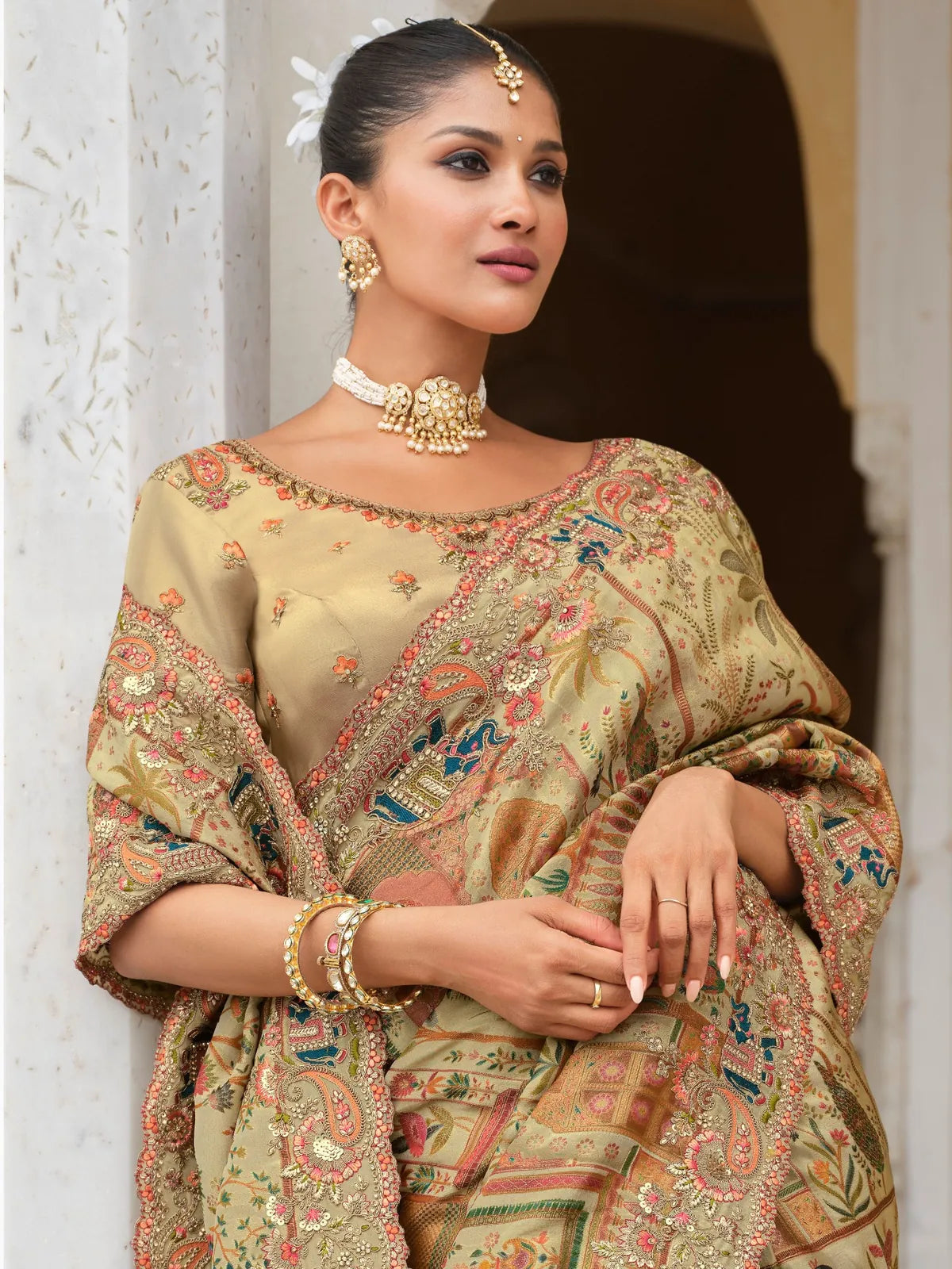 Tarani close-up of beige designer silk saree blouse with intricate embroidery for party wear