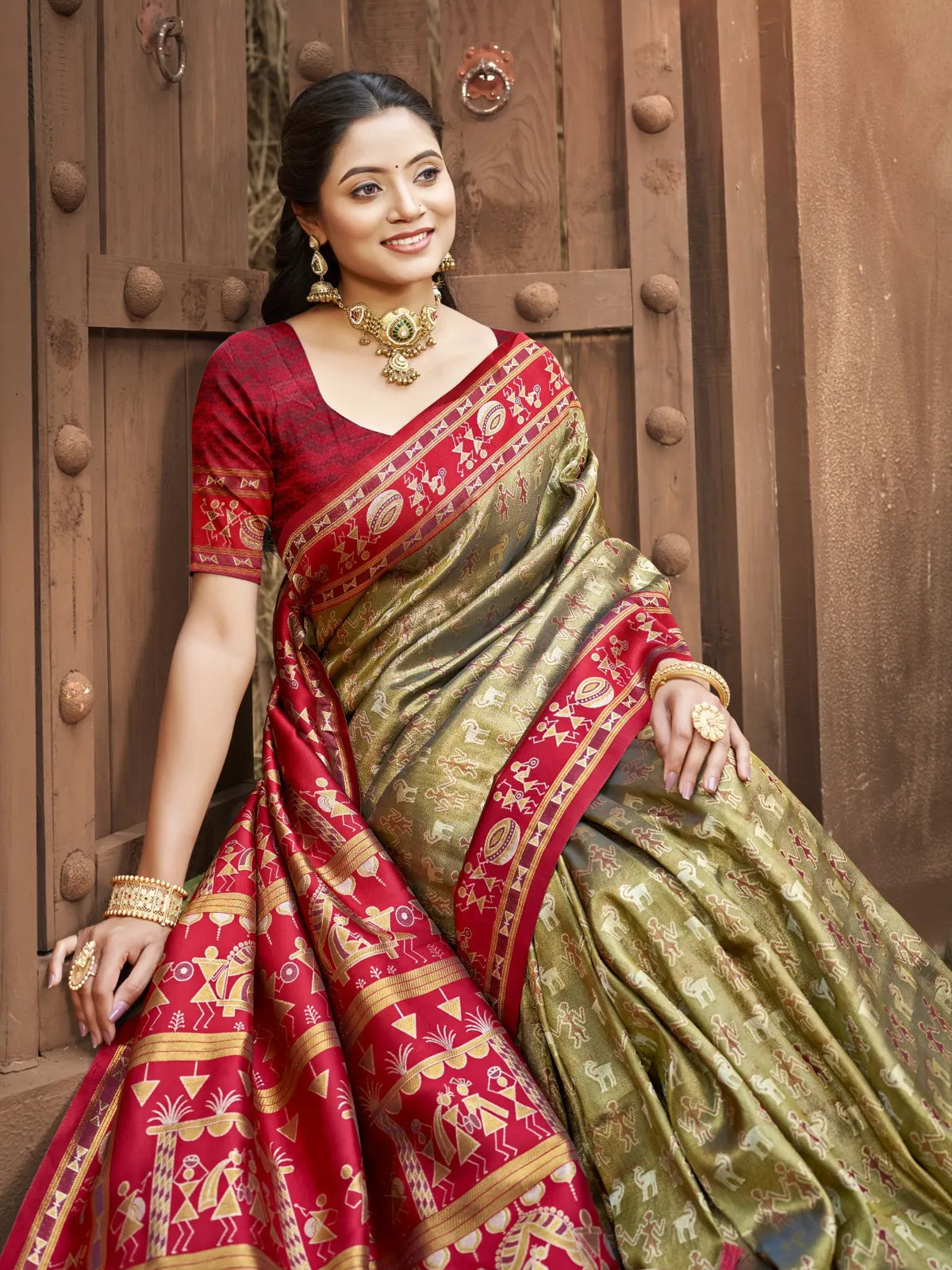 Tarani elegant beige Kanjivaram silk saree with red pallu upper body model view