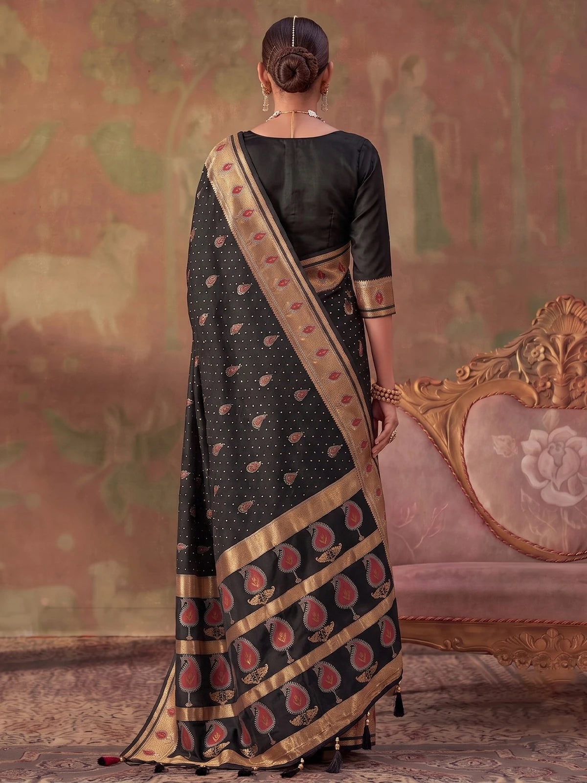Tarani black silk saree back view with elegant zari weaving and pallu
