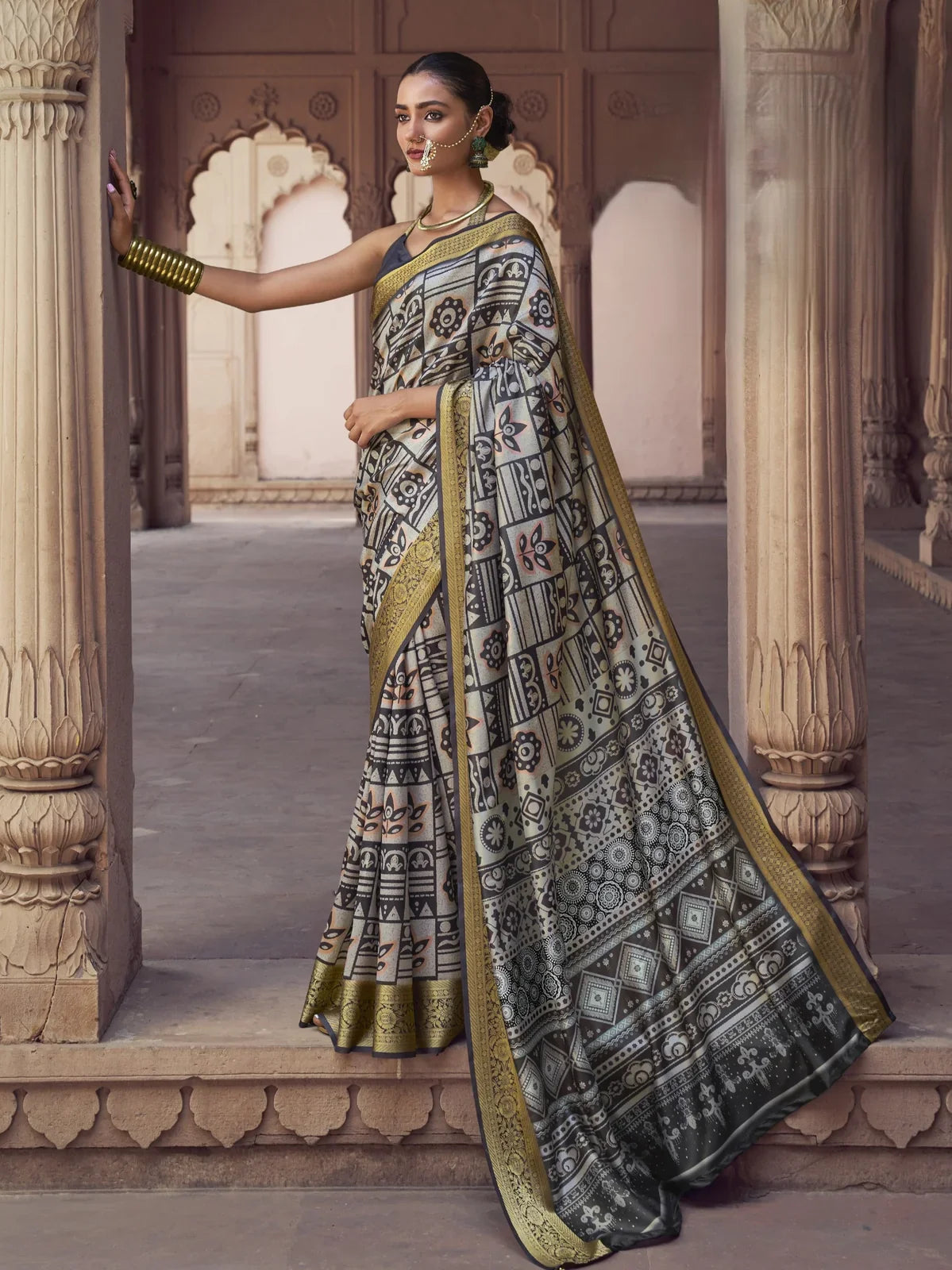 Tarani black silk saree with golden border and digital print full view