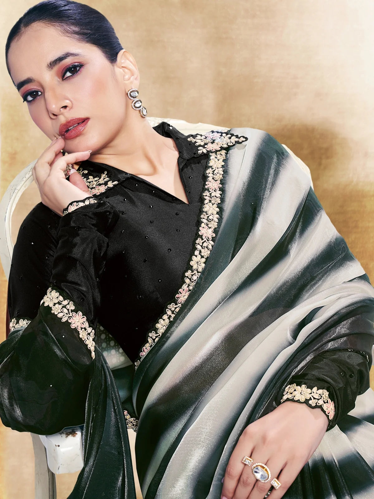 Tarani Anisha black satin silk saree upper body view with embroidered blouse detailing