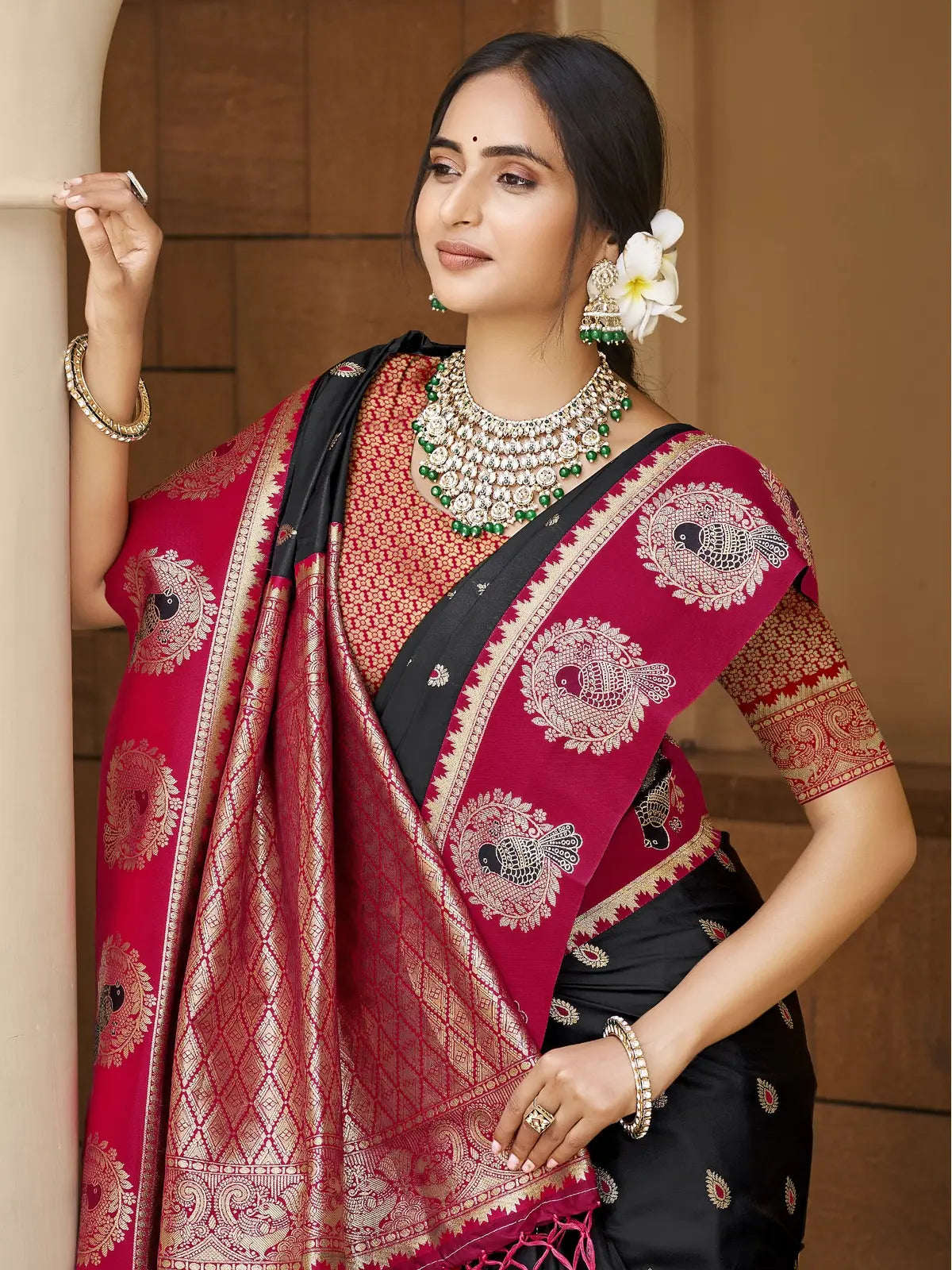 Tarani black silk saree with intricate zari work and contrast red blouse upper body view