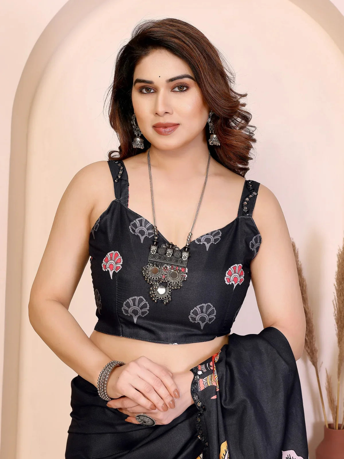 Tarani black manipuri silk saree upper body view showing printed blouse and elegant drape