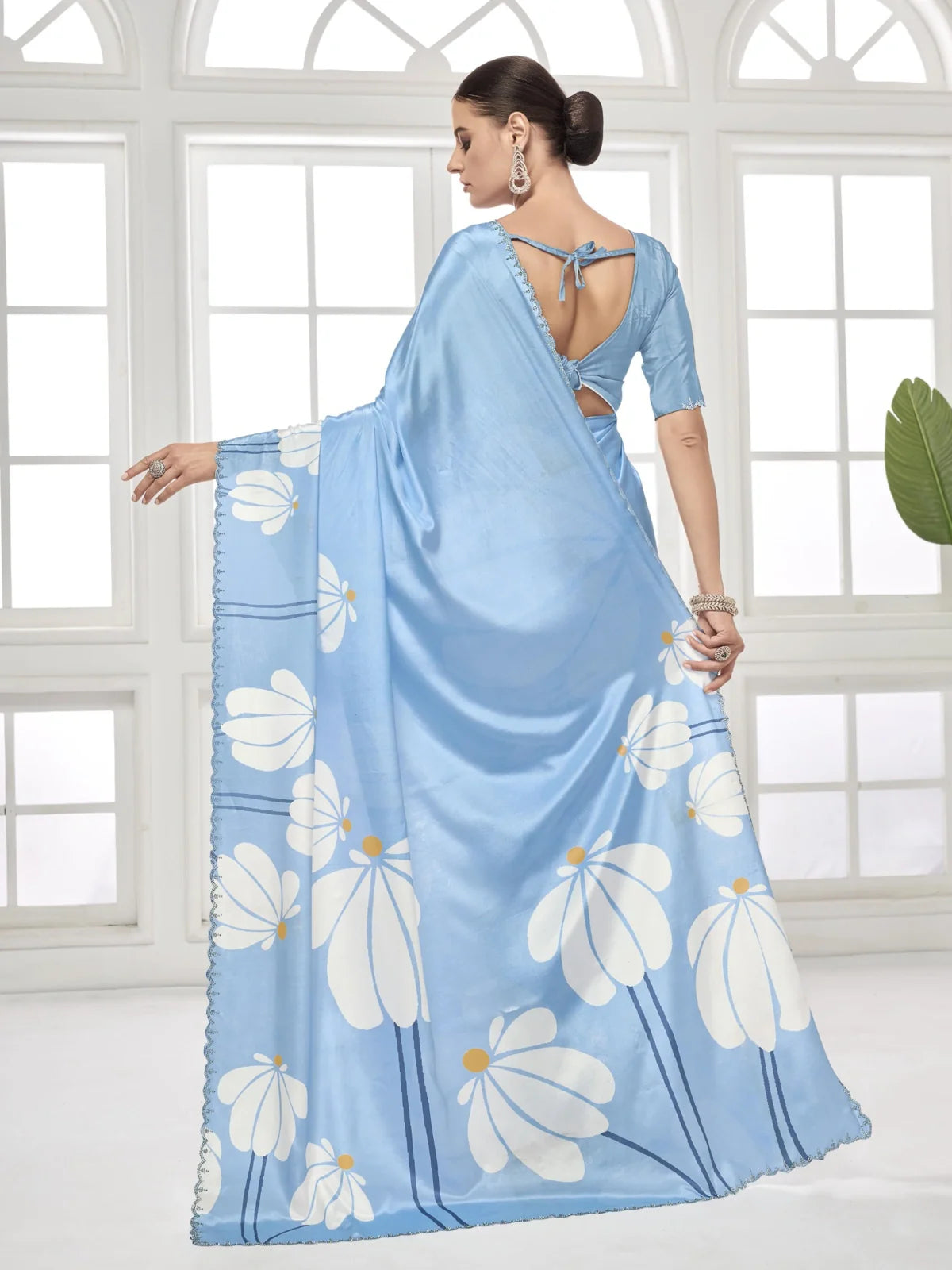 Tarani back blouse view of blue silk crape saree with tie-back blouse and graceful fall