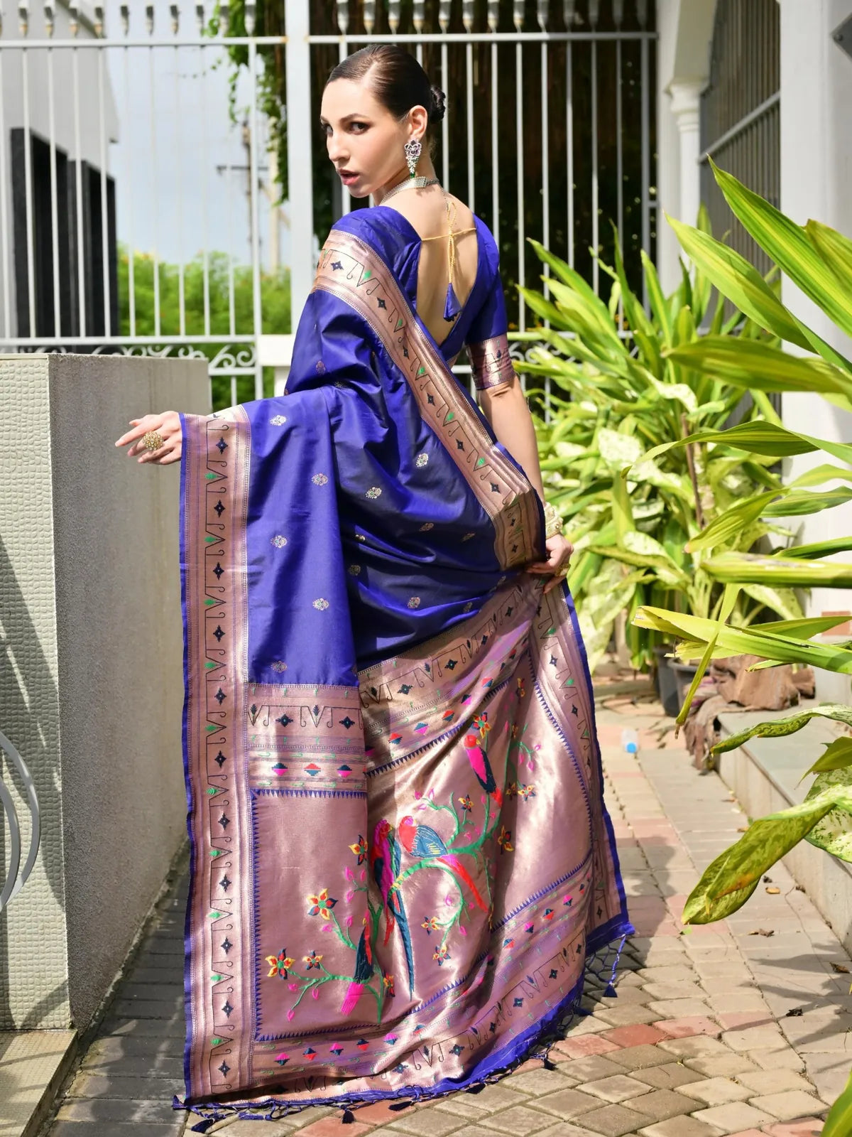 Back view of Tarani blue silk saree with traditional paithani pallu and tassel finish – back view