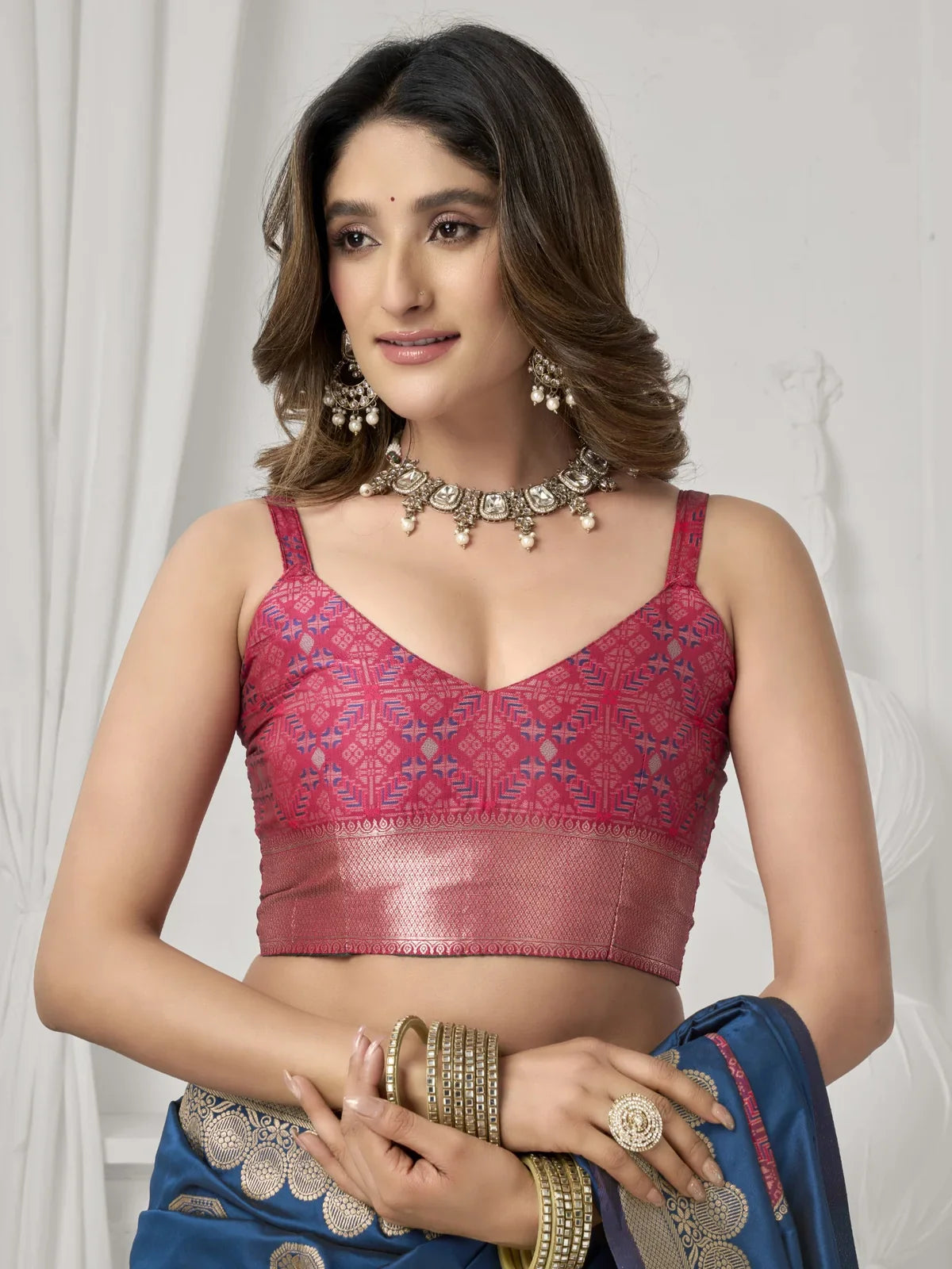 Tarani closeup blouse view in deep pink paired with soft silk saree