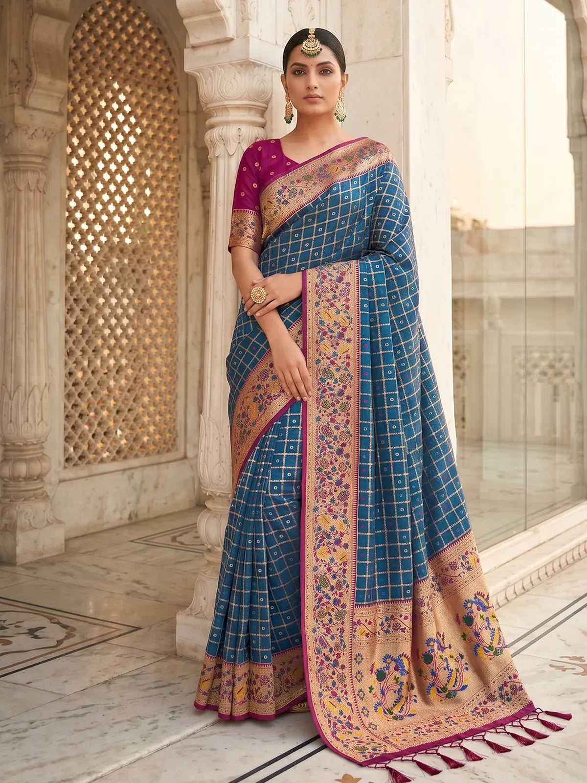 Tarani Archana blue Banarasi silk saree with zari checks and floral border front view