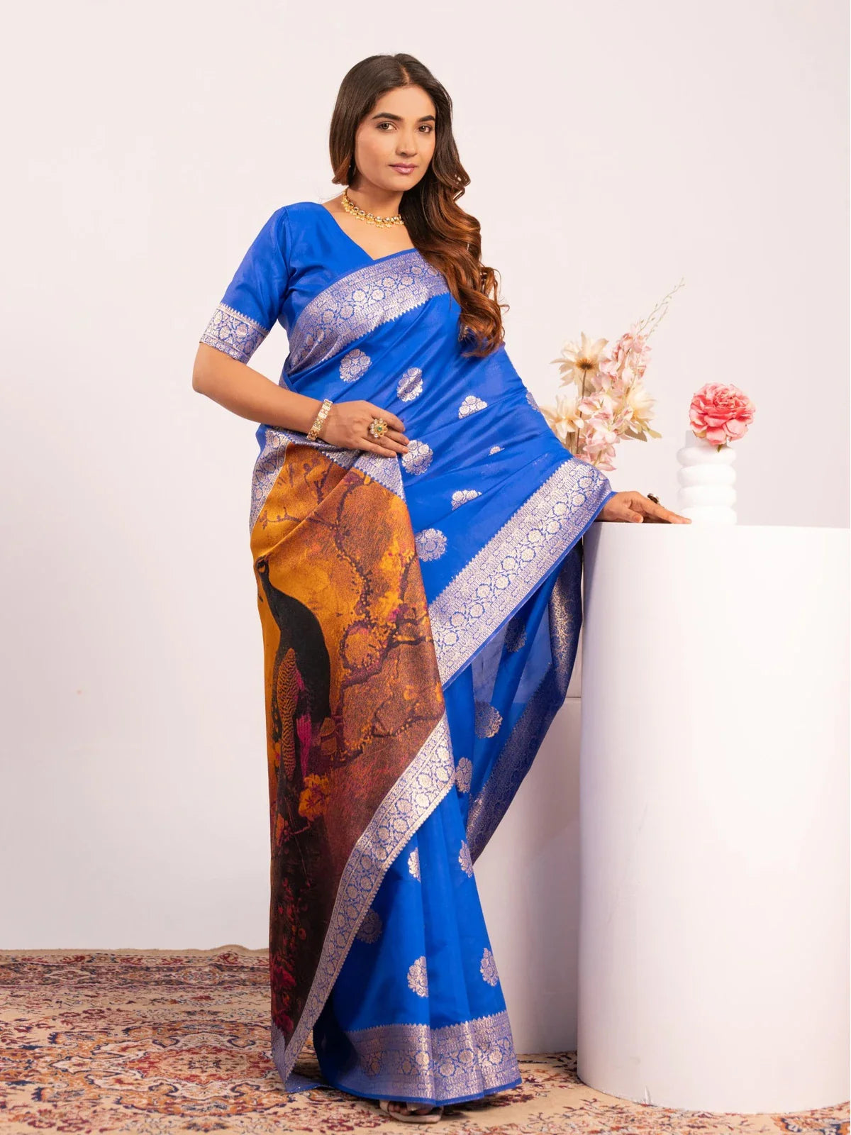 Tarani blue Banarasi silk saree with rich zari work and front view of peacock pallu