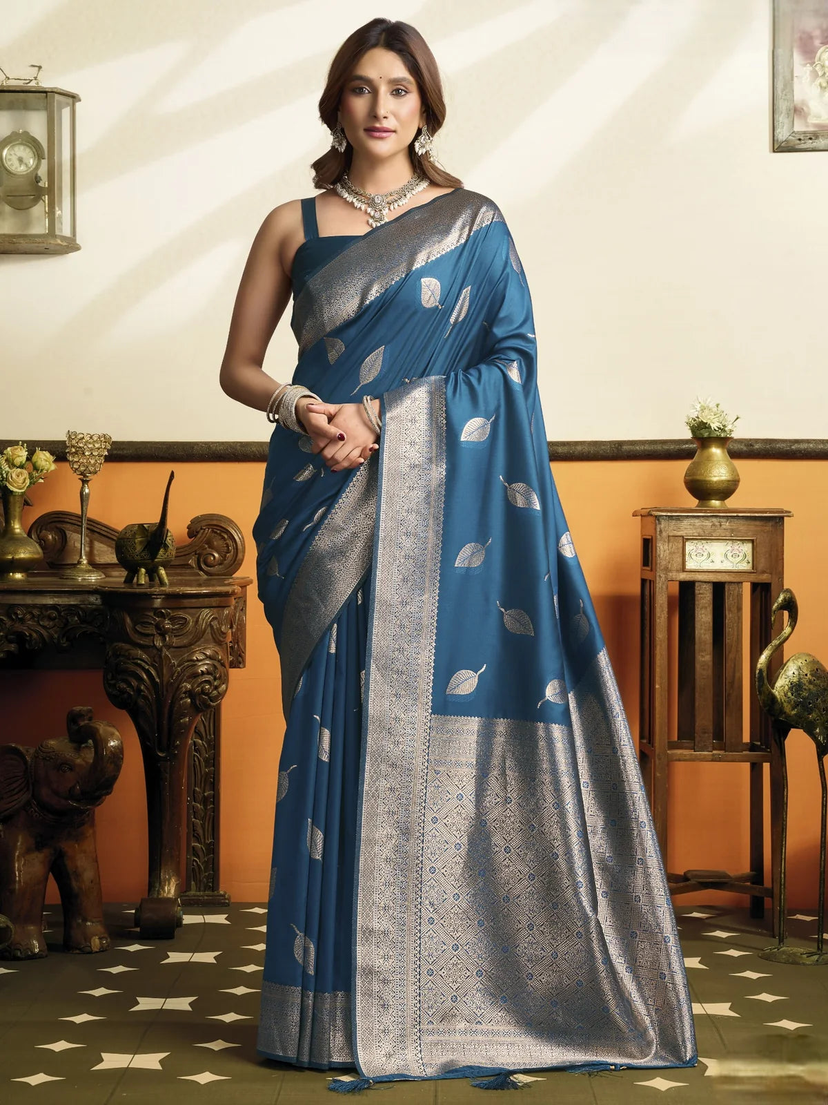 Tarani Pari blue premium soft silk saree with woven leaf motifs, zari border and tassels, full view