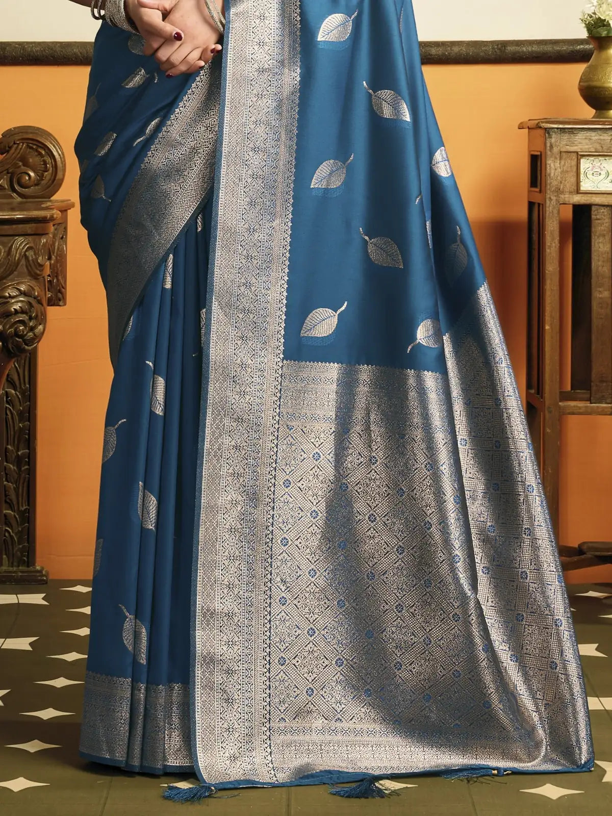 Tarani Pari blue premium soft silk saree with woven leaf motifs, ornate zari pallu and tassels