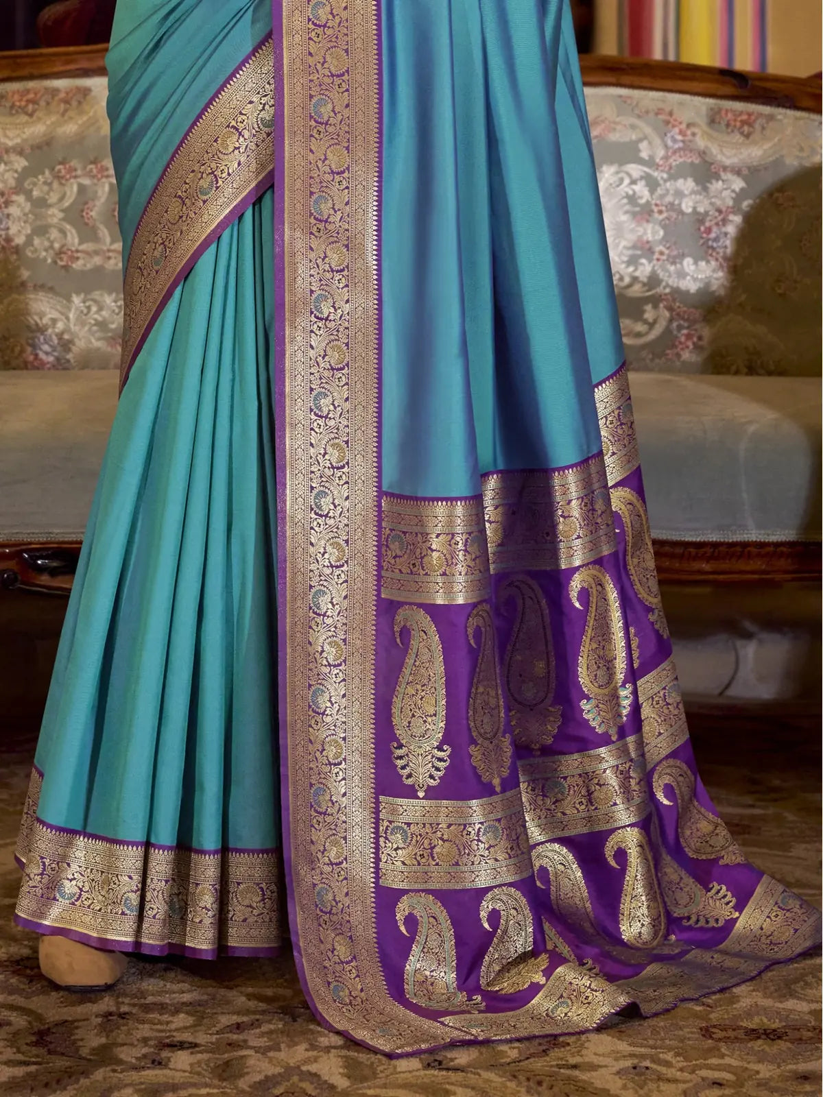 Tarani festive blue silk saree pallu view showing zari border and paisley motifs