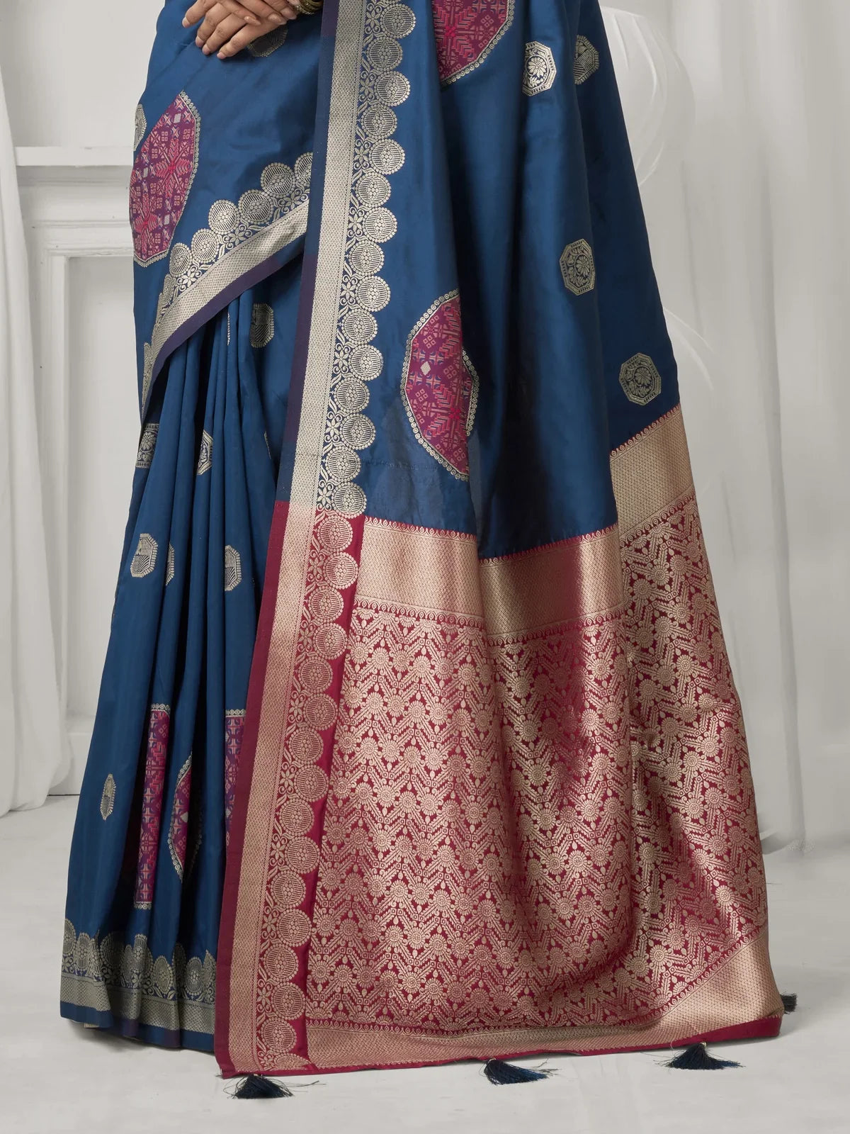 Tarani pallu view of soft blue silk saree with intricate zari weave