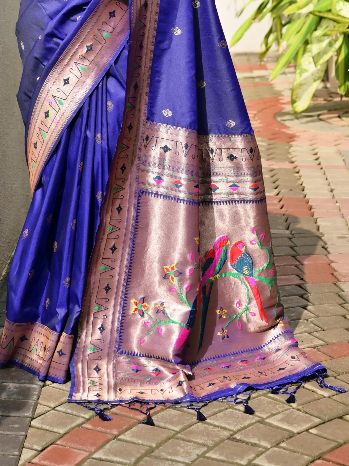 Tarani saree pallu closeup featuring meena work peacock motif and intricate zari detailing – pallu view