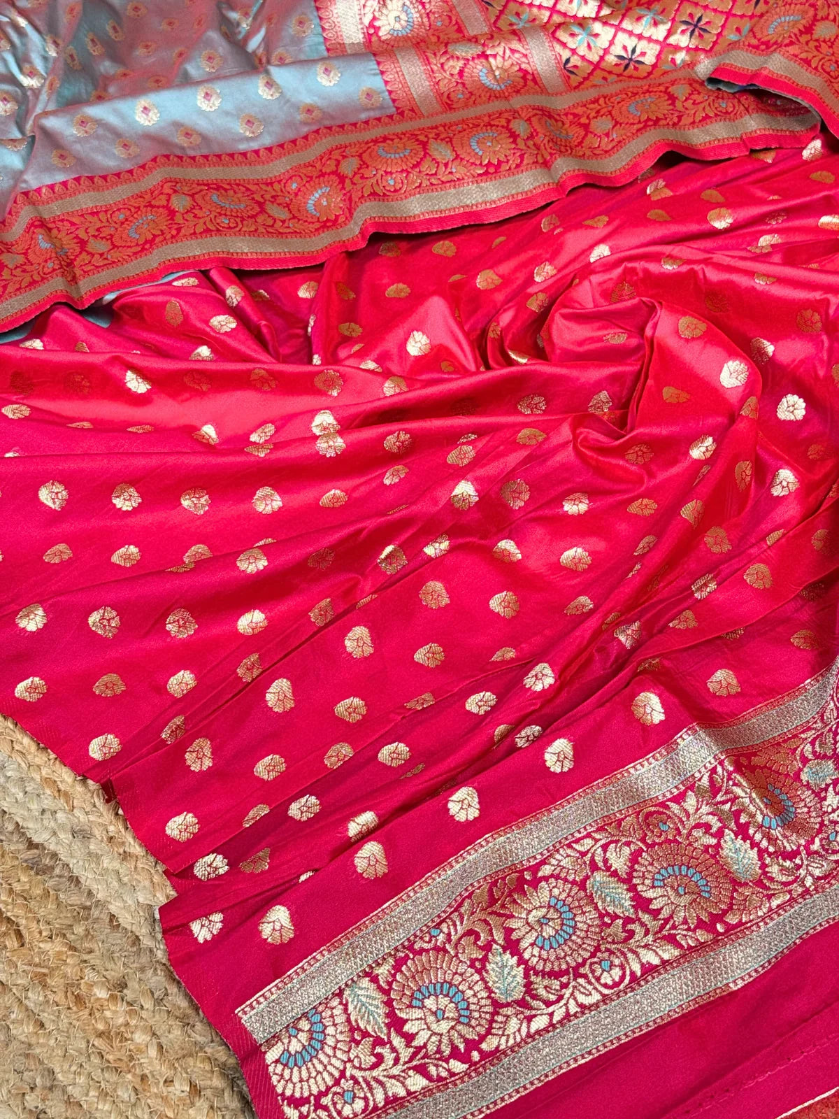 Tarani grey silk saree closeup view showing woven detailing with maroon golden design