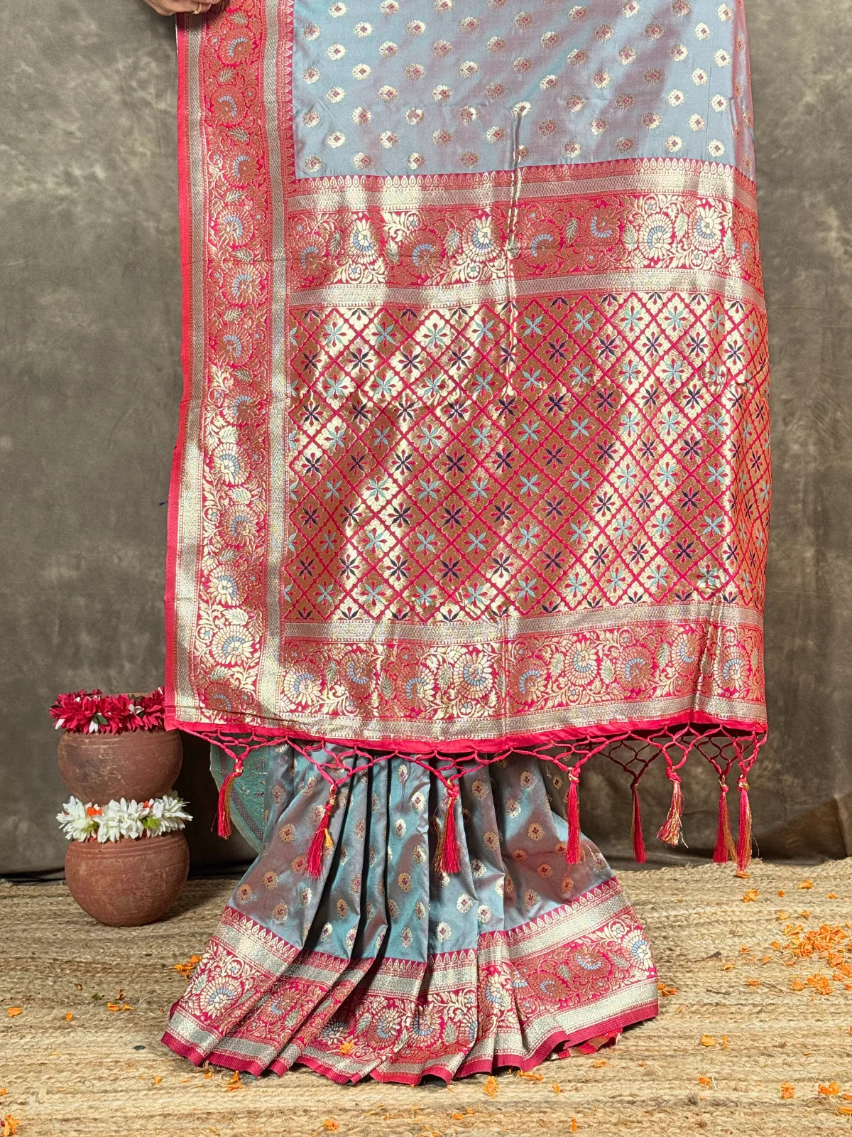 Tarani silk saree pallu view in grey with maroon golden woven border festive look