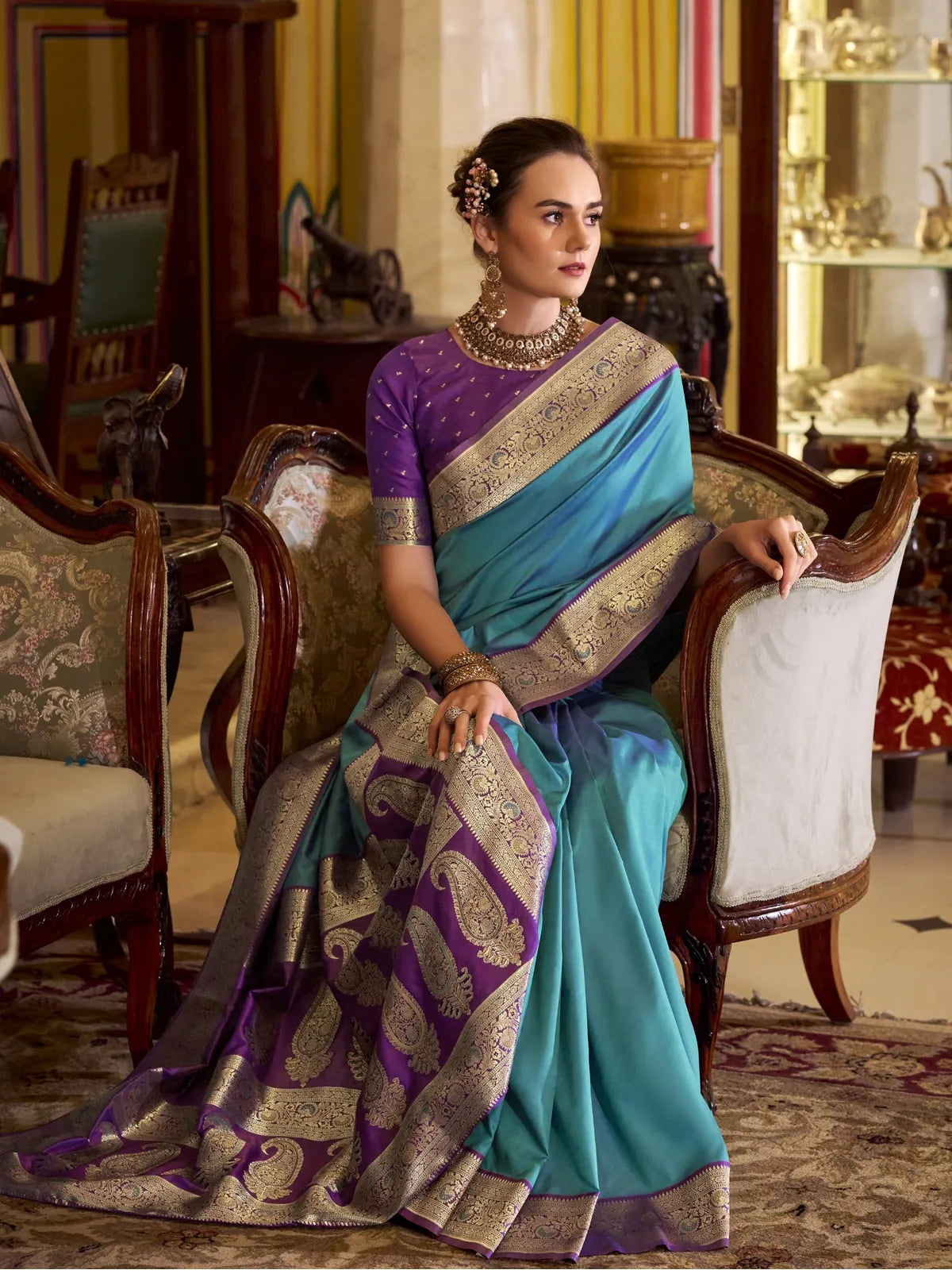 Tarani graceful blue silk saree side view with contrast border and blouse design