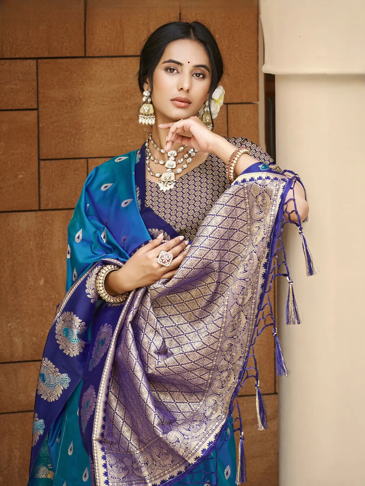 Tarani blue silk saree upper body view with zari woven blouse and elegant jewellery styling