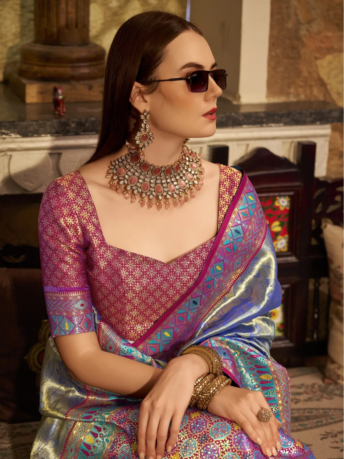 Tarani premium blue silk saree upper body view highlighting blouse and necklace